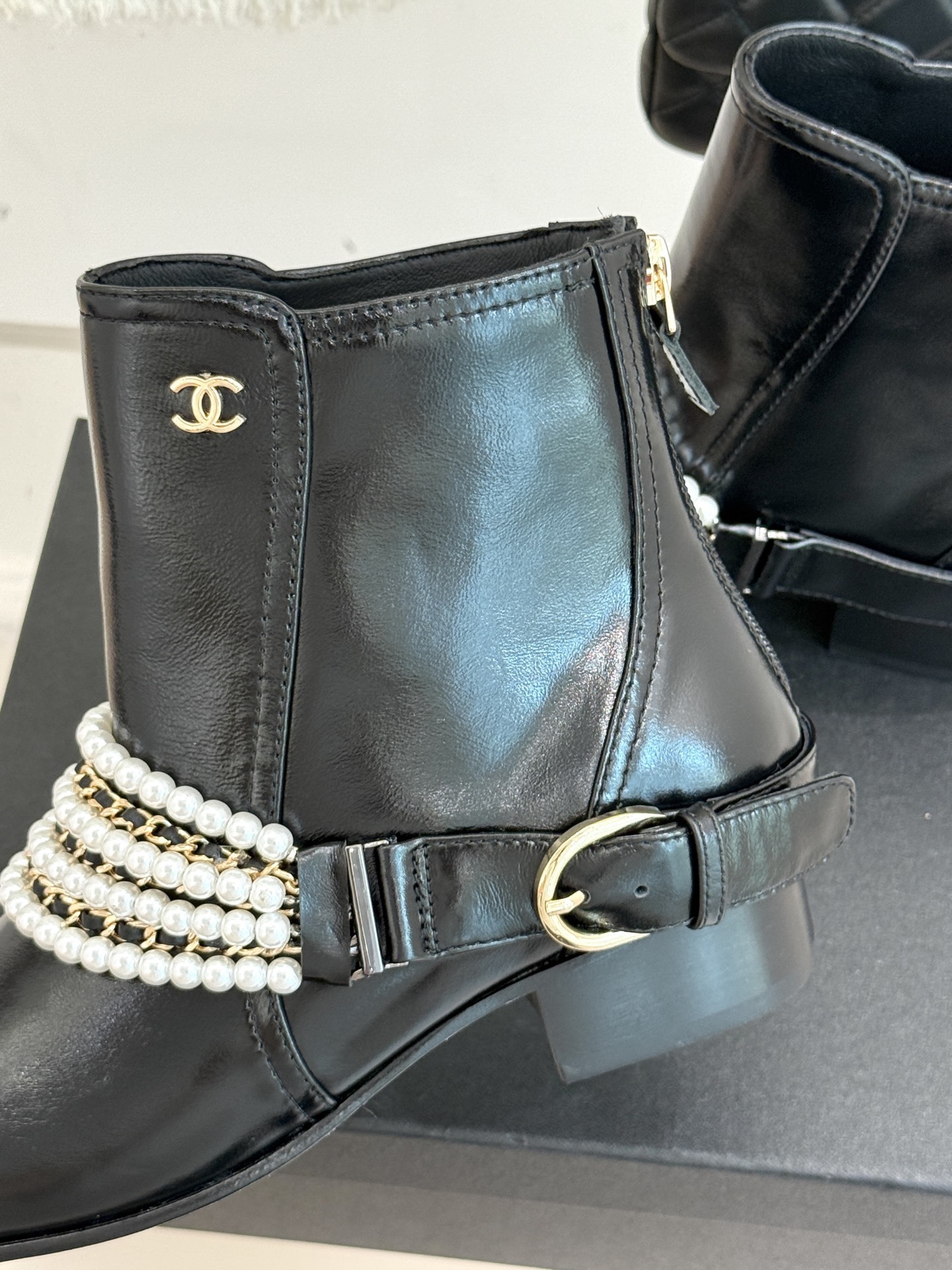 Luxury Black Leather Ankle Boots with Pearl Chain Detail