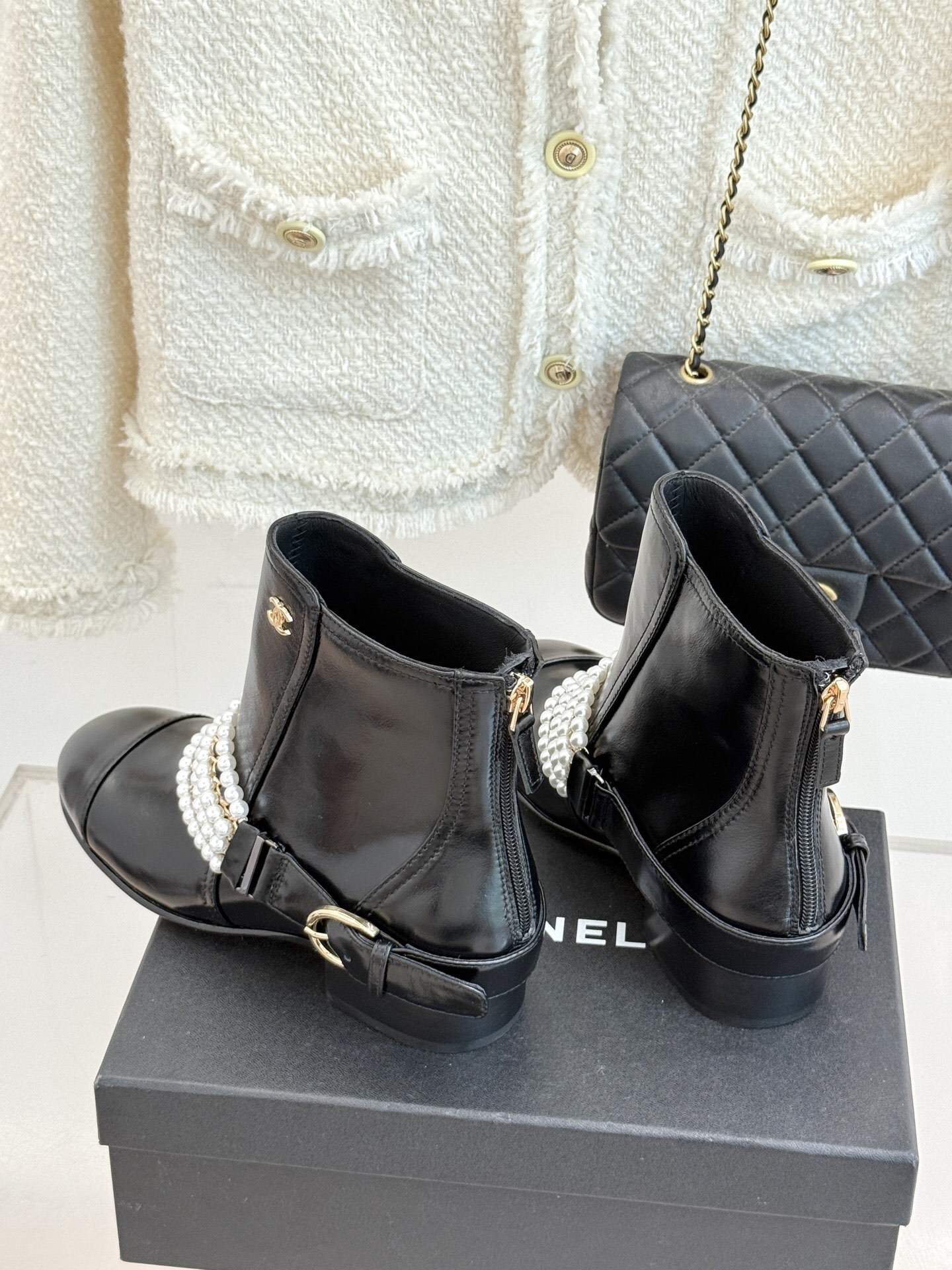 Luxury Black Leather Ankle Boots with Pearl Chain Detail