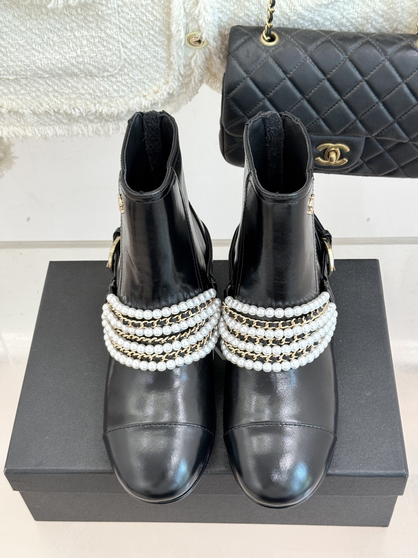 Luxury Black Leather Ankle Boots with Pearl Chain Detail