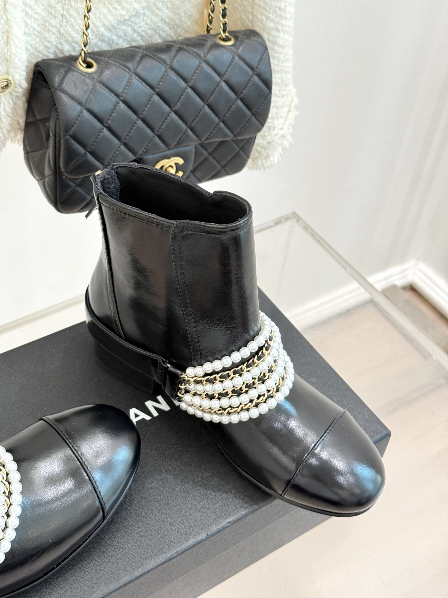 Luxury Black Leather Ankle Boots with Pearl Chain Detail