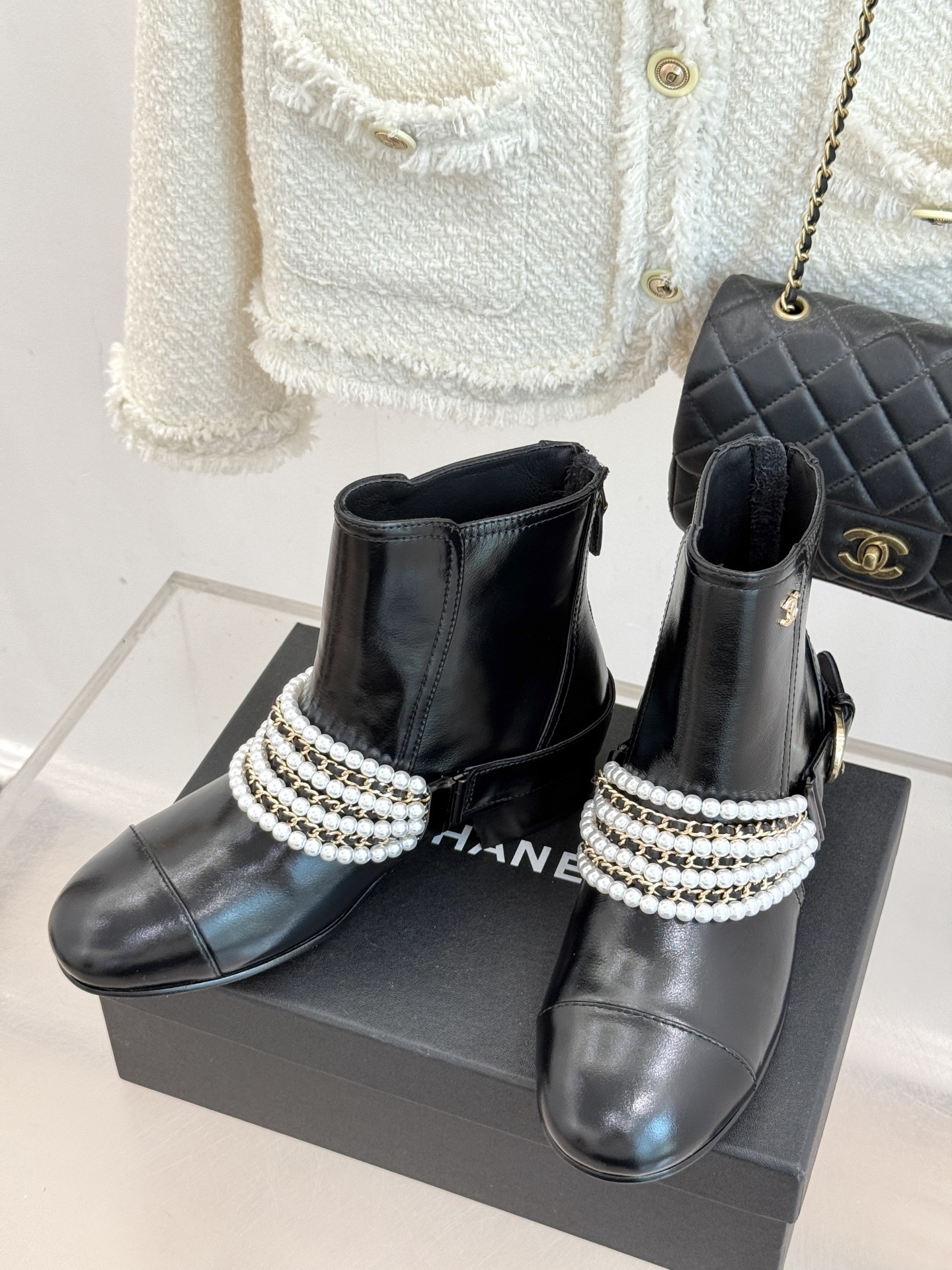 Luxury Black Leather Ankle Boots with Pearl Chain Detail