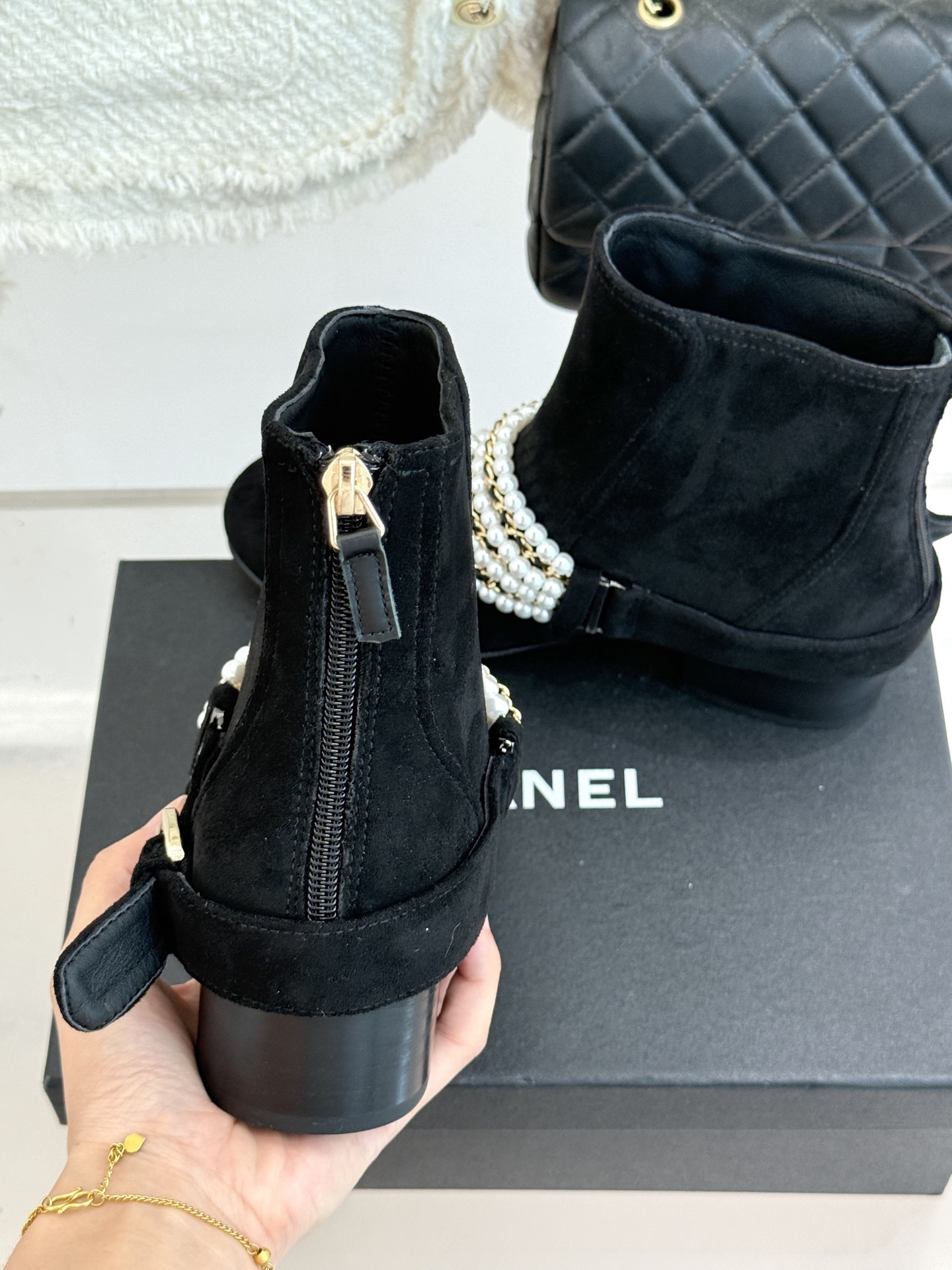 Luxury Black Suede Ankle Boots with Pearl and Gold Chain Detail