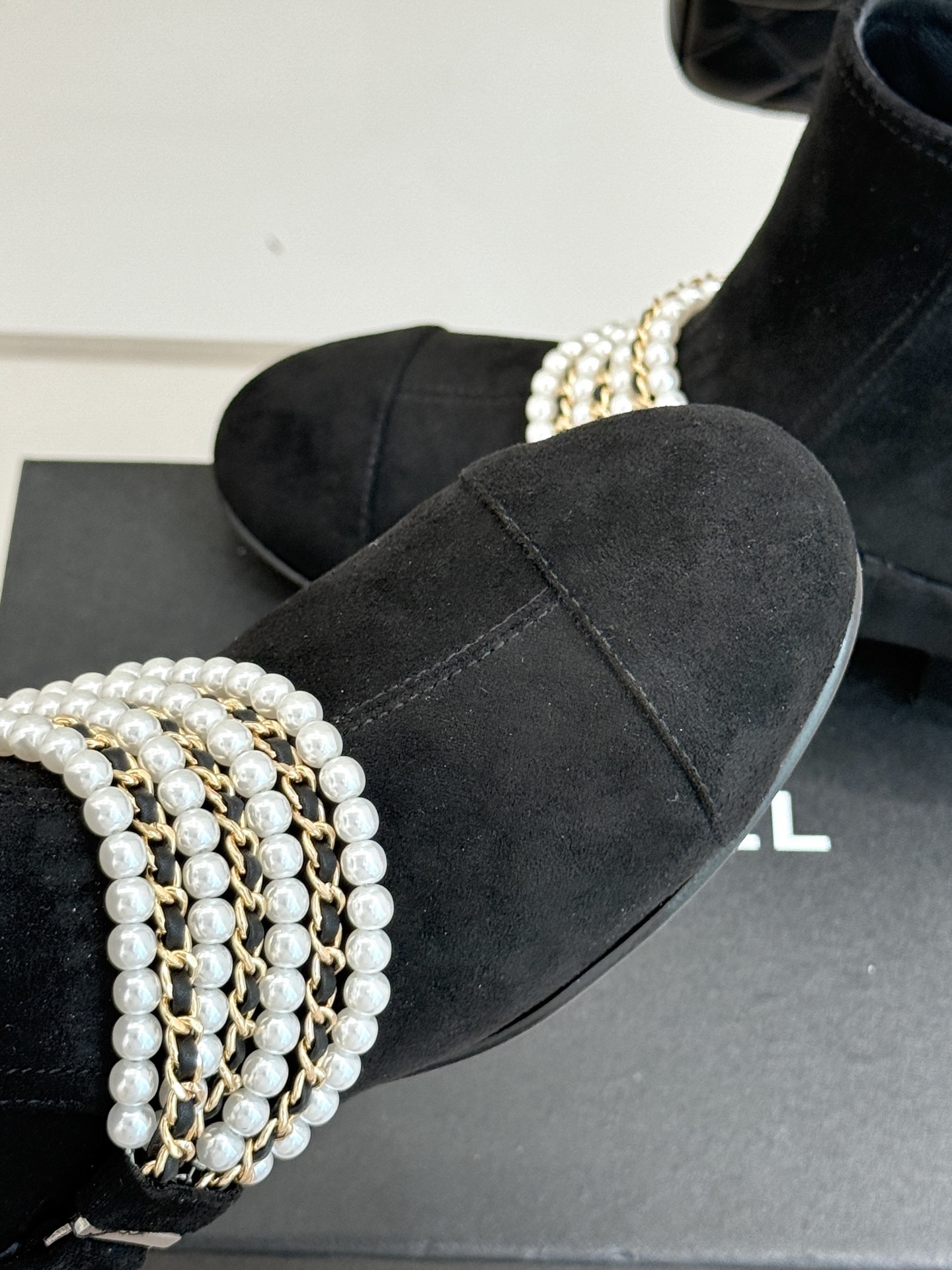 Luxury Black Suede Ankle Boots with Pearl and Gold Chain Detail
