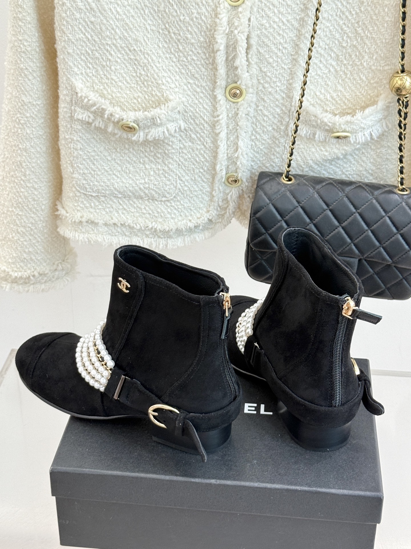 Luxury Black Suede Ankle Boots with Pearl and Gold Chain Detail