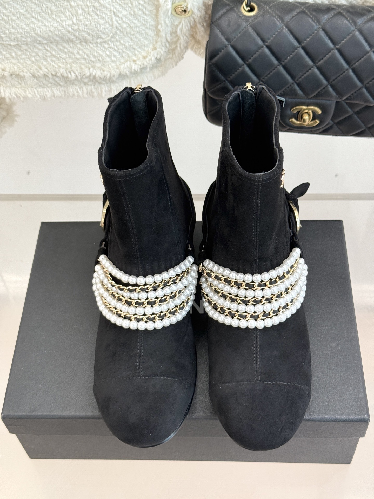 Luxury Black Suede Ankle Boots with Pearl and Gold Chain Detail