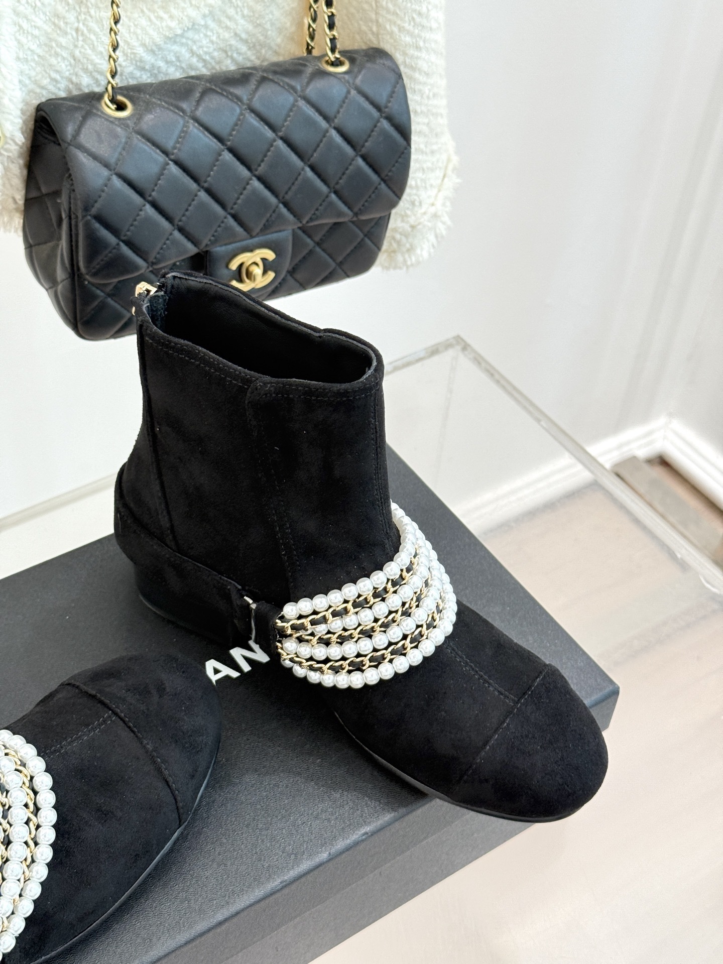 Luxury Black Suede Ankle Boots with Pearl and Gold Chain Detail