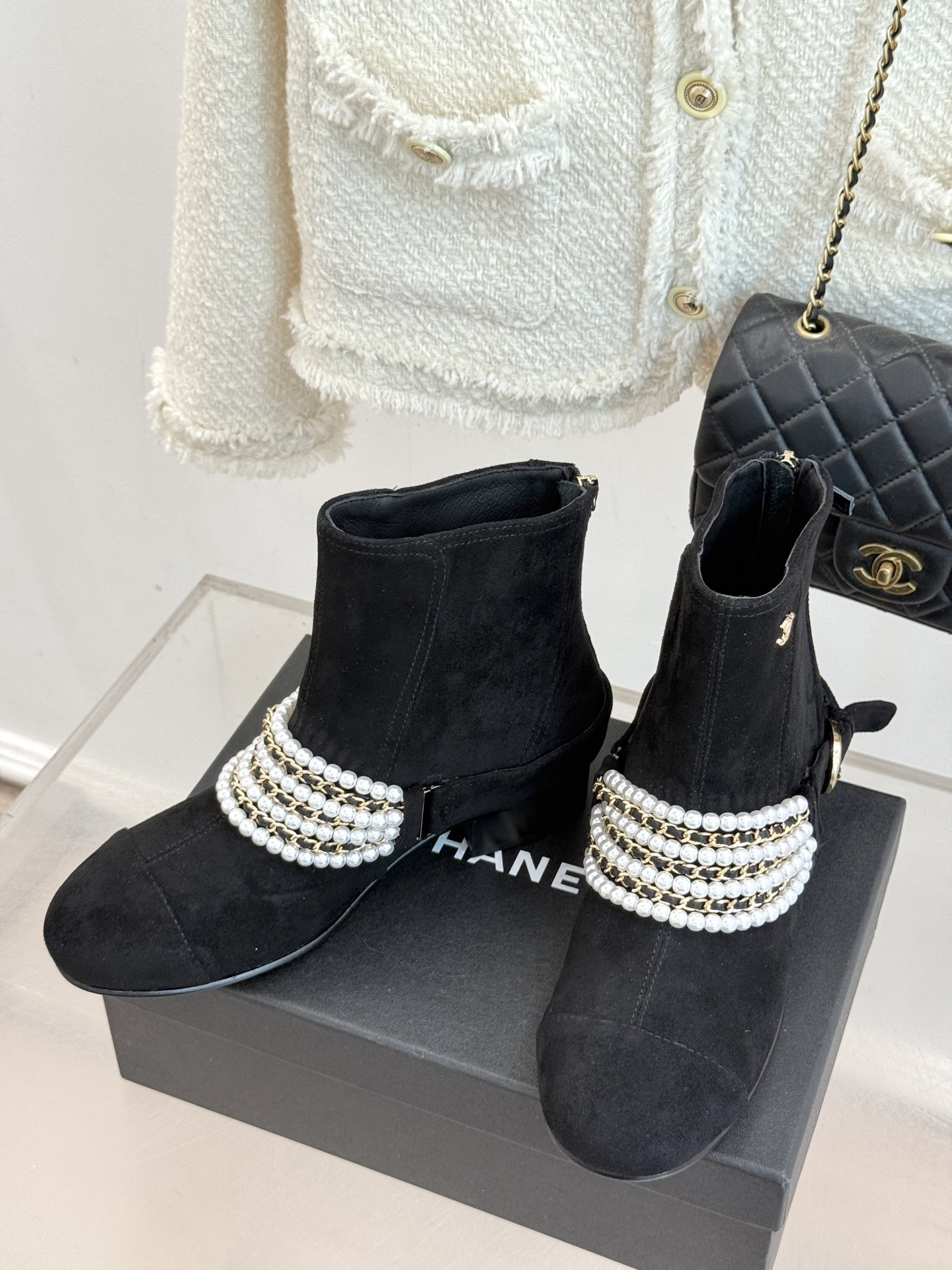 Luxury Black Suede Ankle Boots with Pearl and Gold Chain Detail
