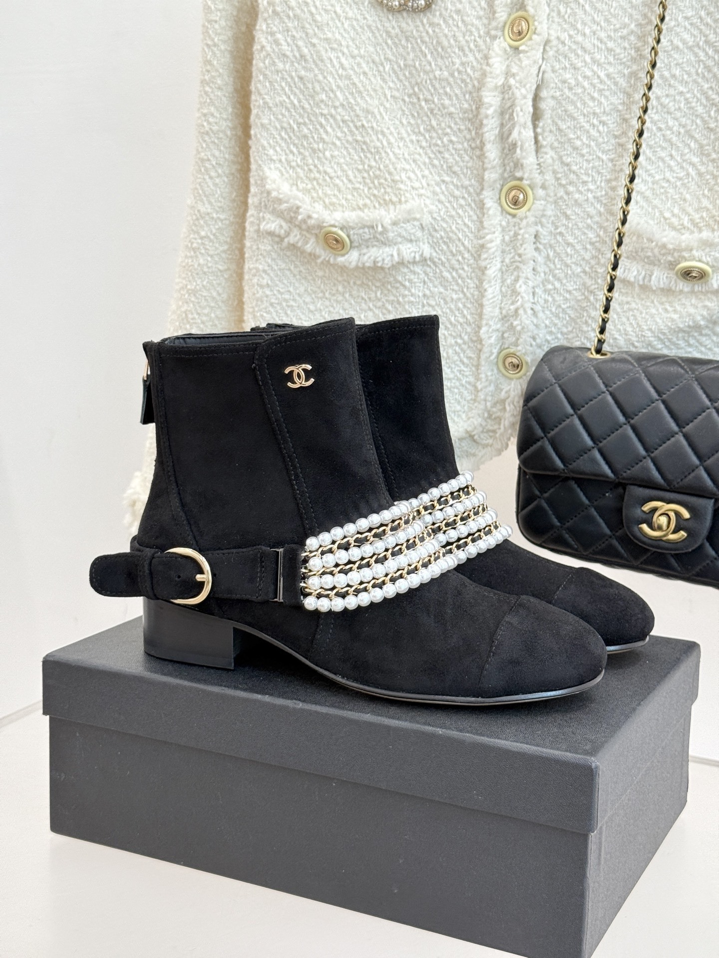 Luxury Black Suede Ankle Boots with Pearl and Gold Chain Detail