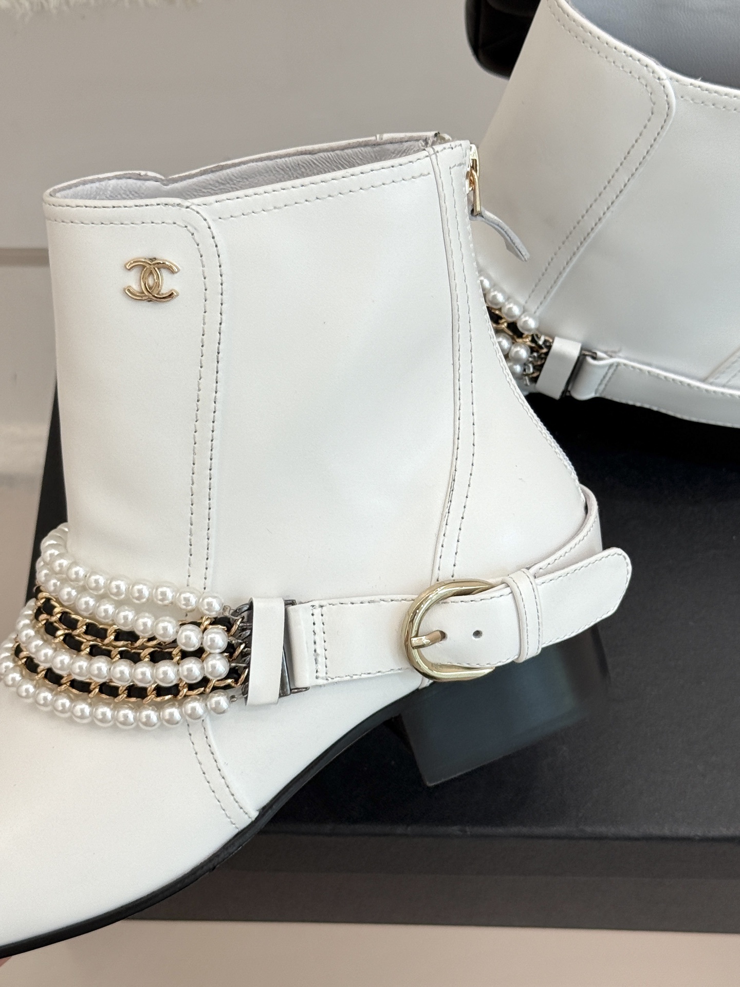 Luxury Pearl Chain White Leather Ankle Boots with Black Toe Cap