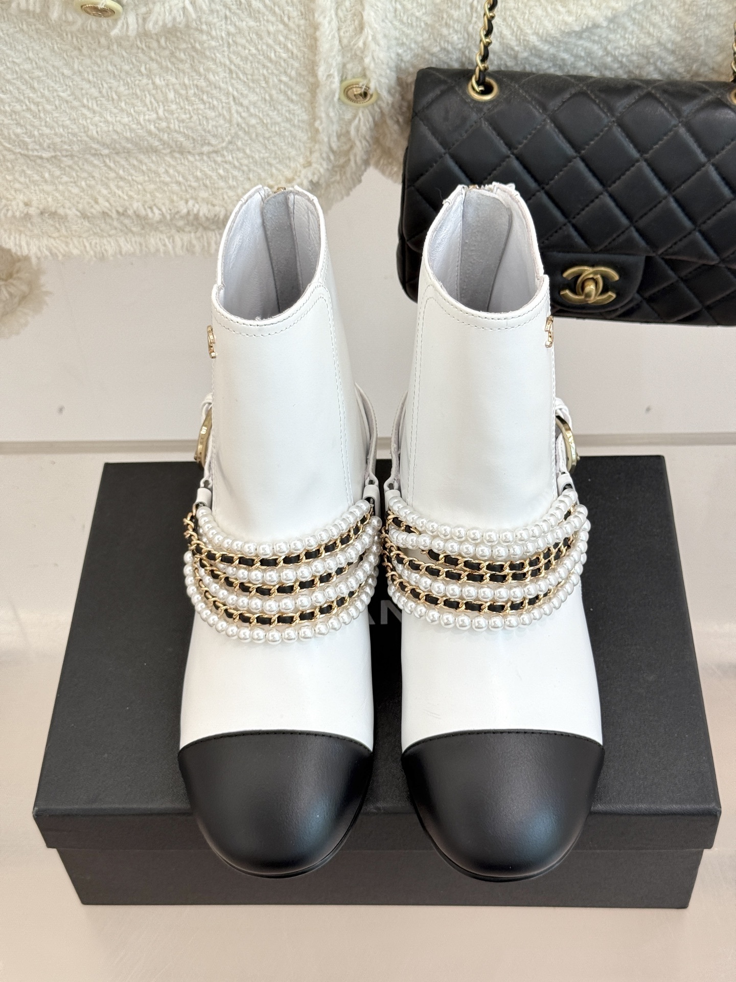 Luxury Pearl Chain White Leather Ankle Boots with Black Toe Cap
