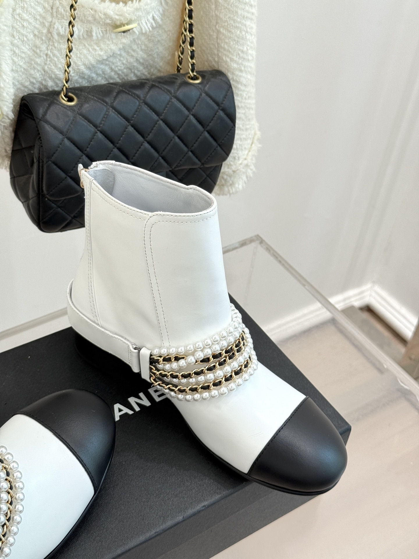 Luxury Pearl Chain White Leather Ankle Boots with Black Toe Cap