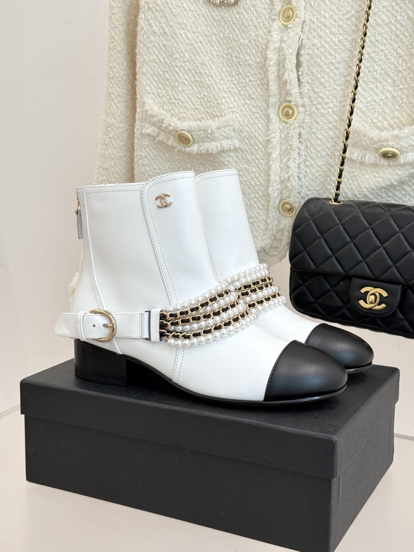 Luxury Pearl Chain White Leather Ankle Boots with Black Toe Cap