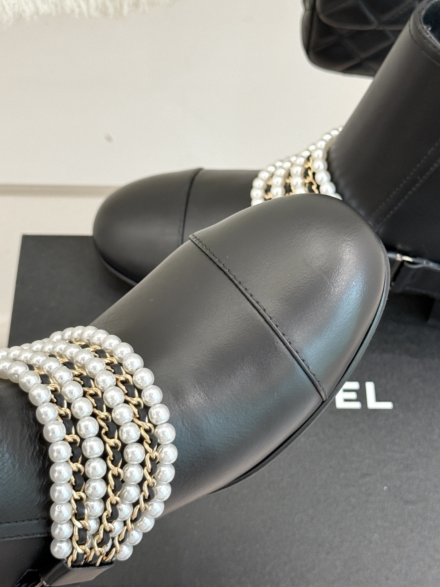 Luxury Black Leather Ankle Boots with Pearl Chain & Gold Accents