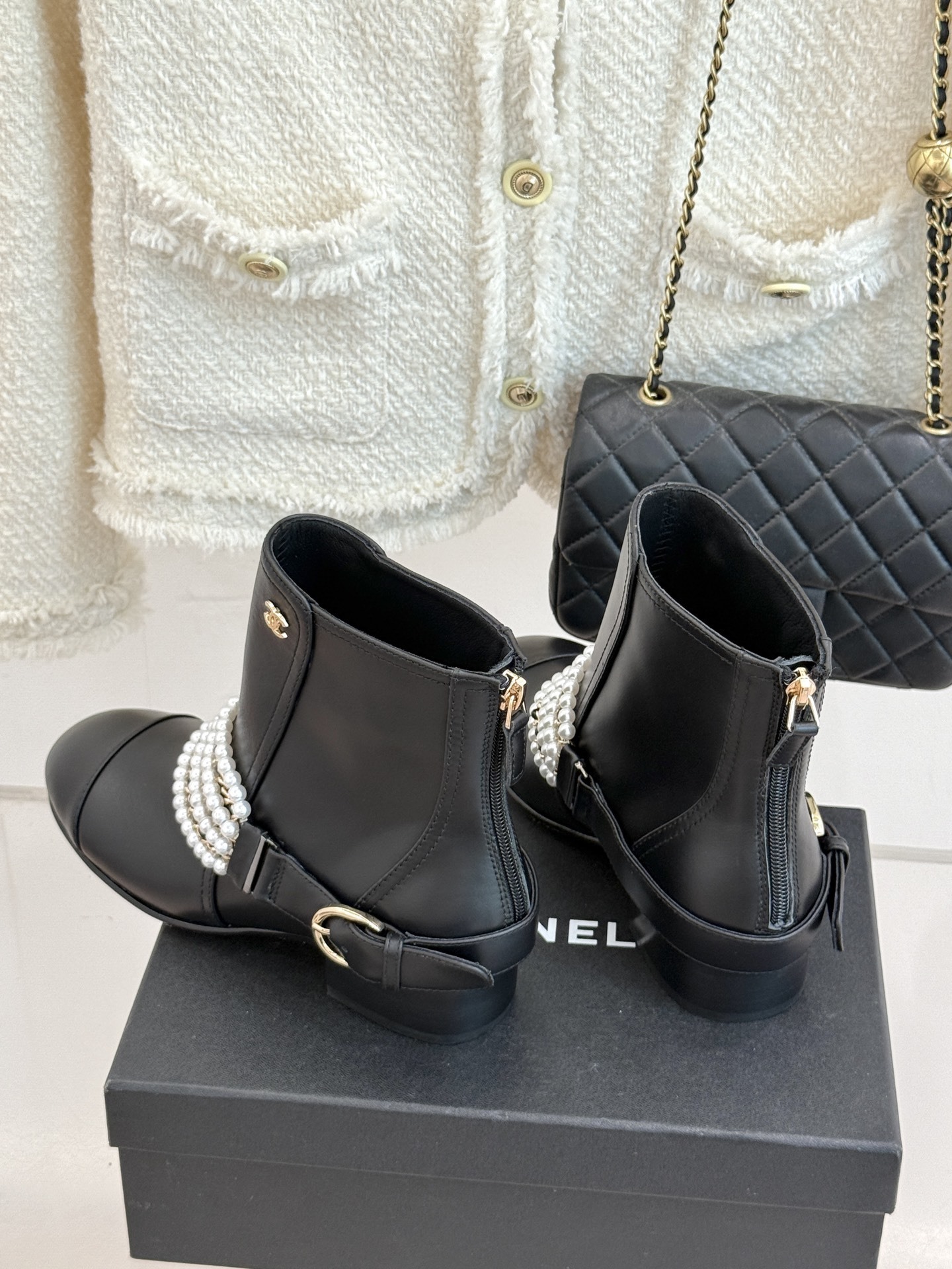 Luxury Black Leather Ankle Boots with Pearl Chain & Gold Accents