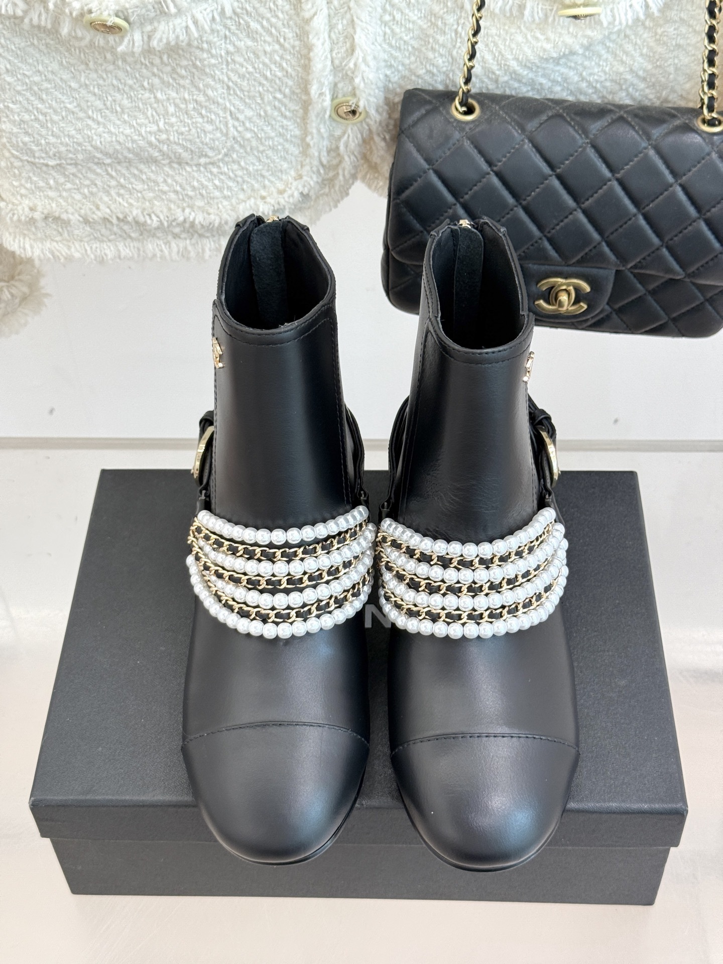 Luxury Black Leather Ankle Boots with Pearl Chain & Gold Accents