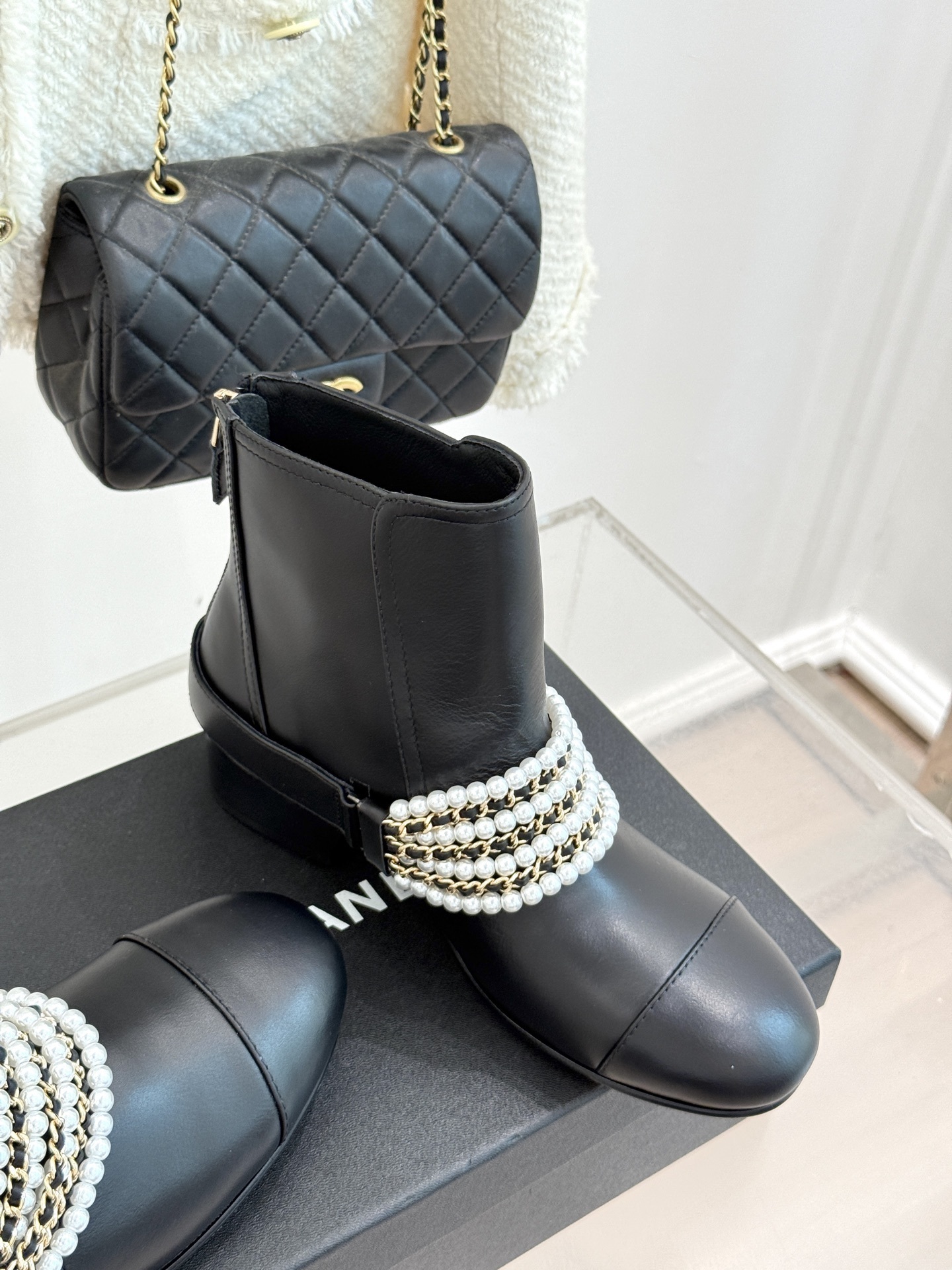 Luxury Black Leather Ankle Boots with Pearl Chain & Gold Accents