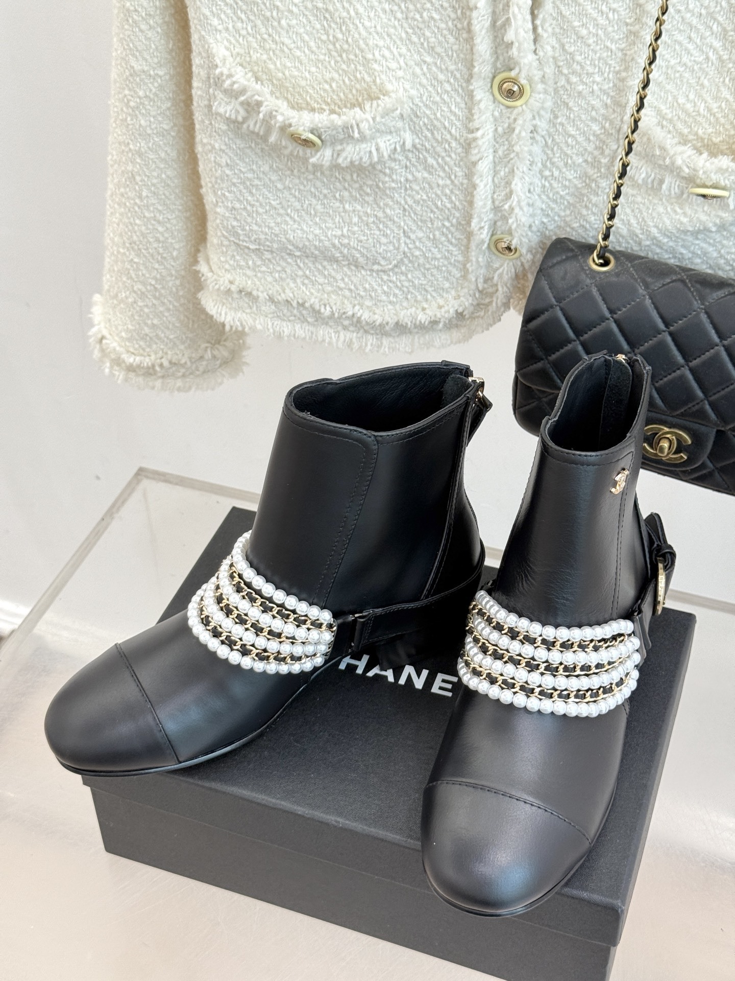 Luxury Black Leather Ankle Boots with Pearl Chain & Gold Accents