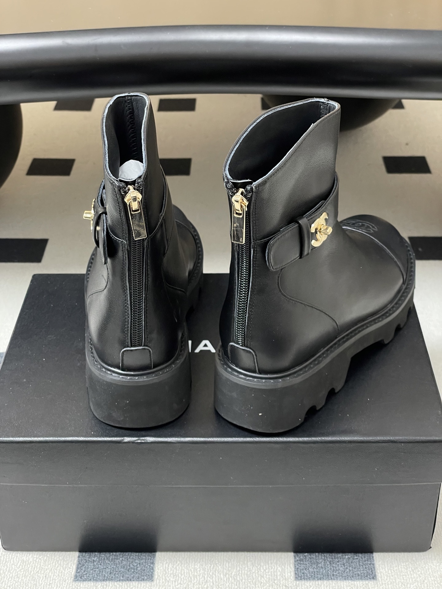 Women's Black Leather Lug Sole Ankle Boots with Gold Hardware