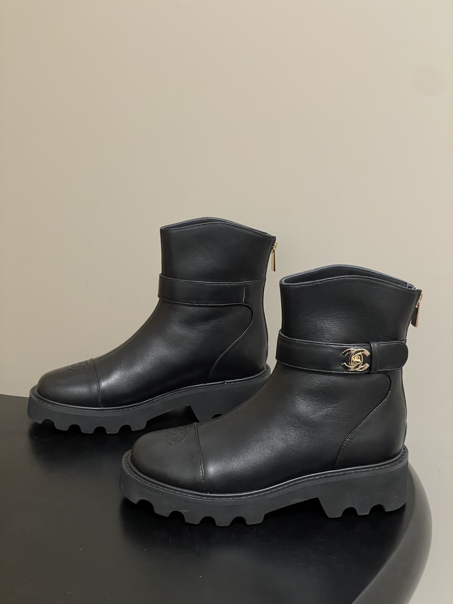 Women's Black Leather Lug Sole Ankle Boots with Gold Hardware