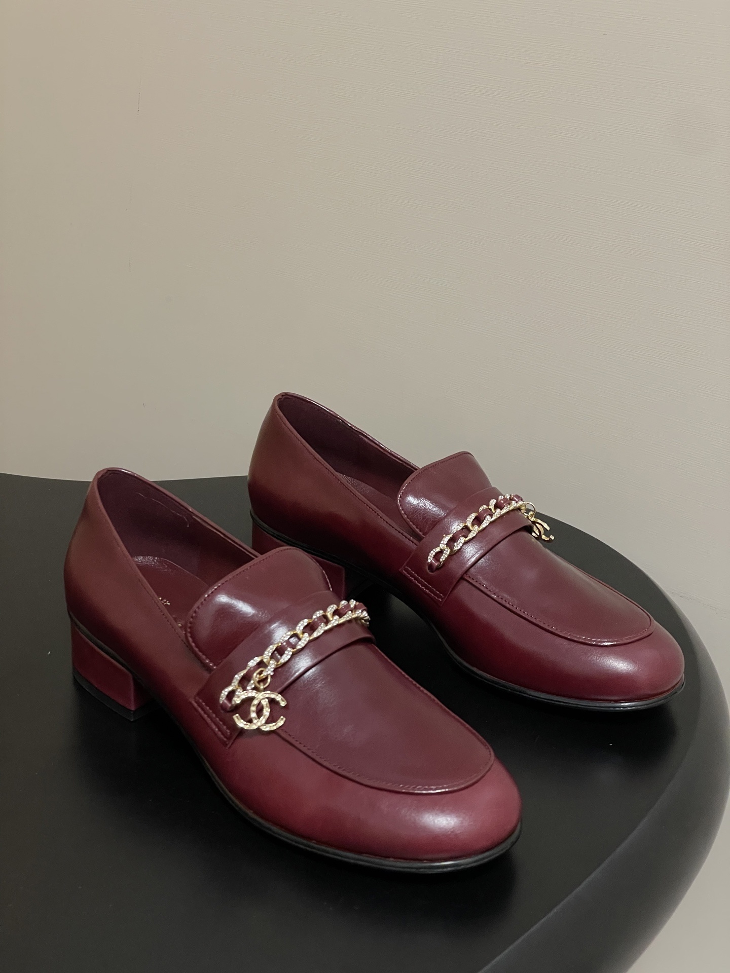 Luxury Burgundy Leather Loafers with Gold Chain Detail