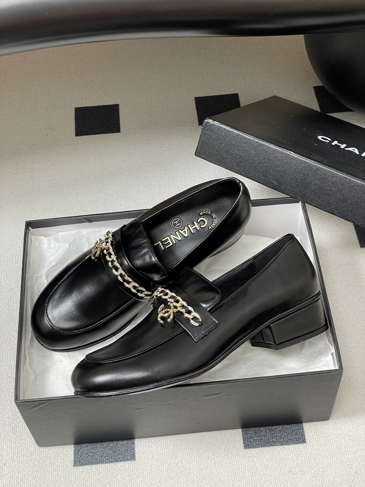 Women's Luxury Black Leather Loafers with Crystal Gold Chain Detail