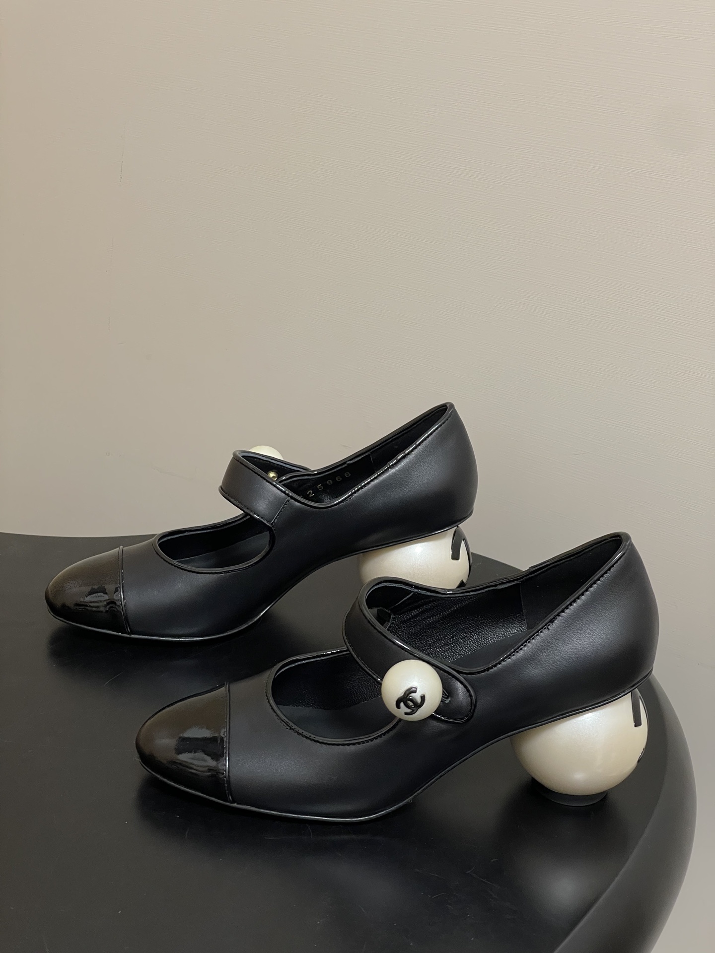 Chanel Pearl Heel Mary Janes: Black Leather with Patent Toe