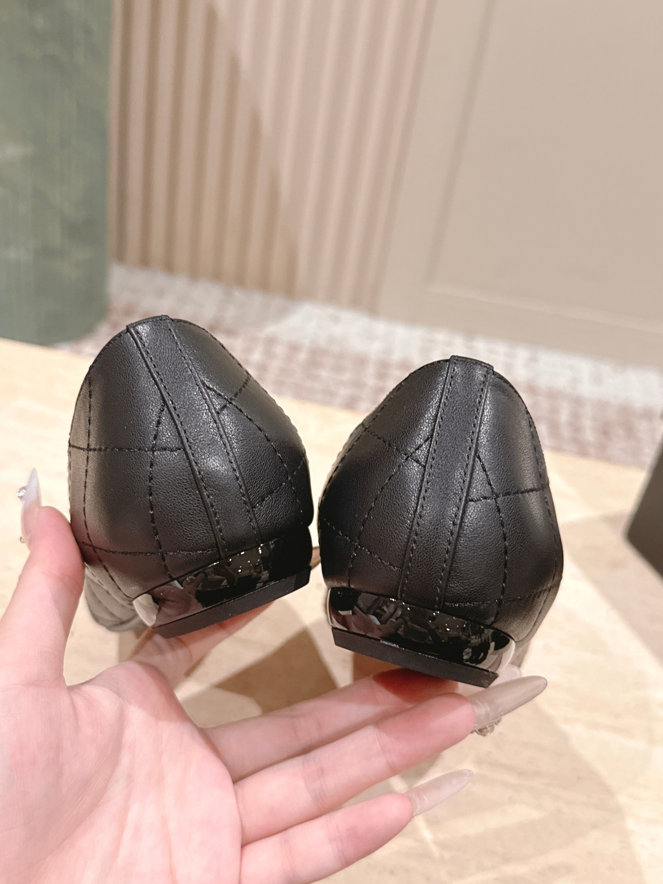 Chanel Quilted Black Leather Flats with White CC Logo