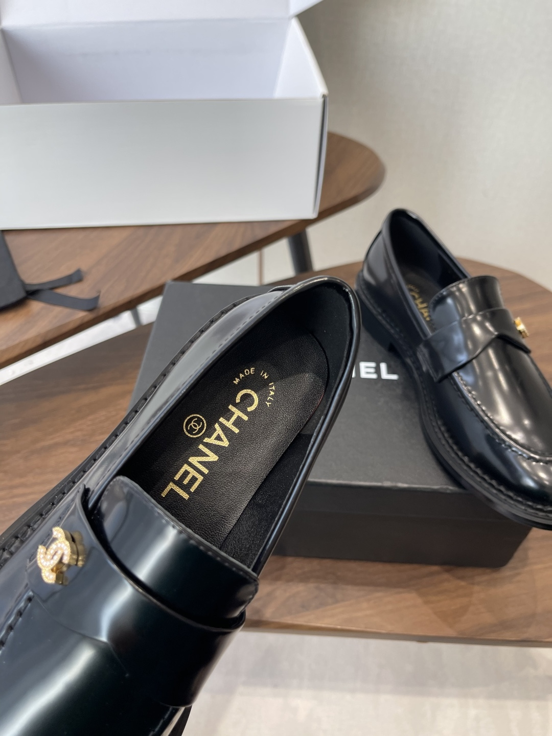 Luxury Chanel Black Calfskin Loafers with Gold CC Hardware