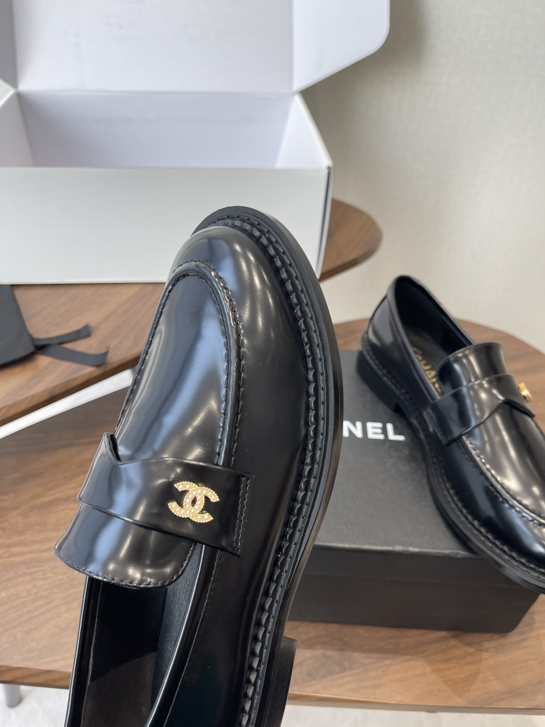 Luxury Chanel Black Calfskin Loafers with Gold CC Hardware