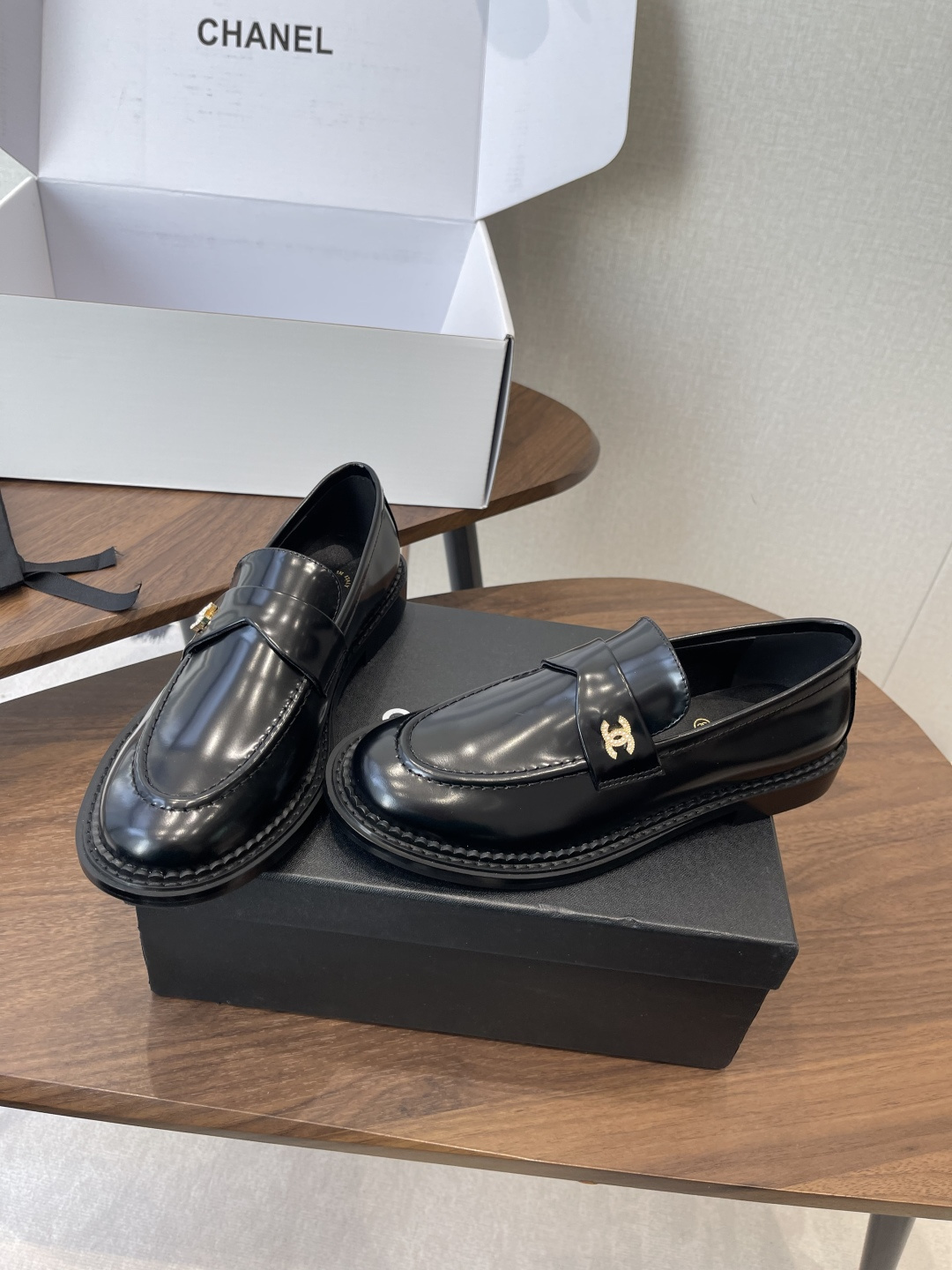 Luxury Chanel Black Calfskin Loafers with Gold CC Hardware