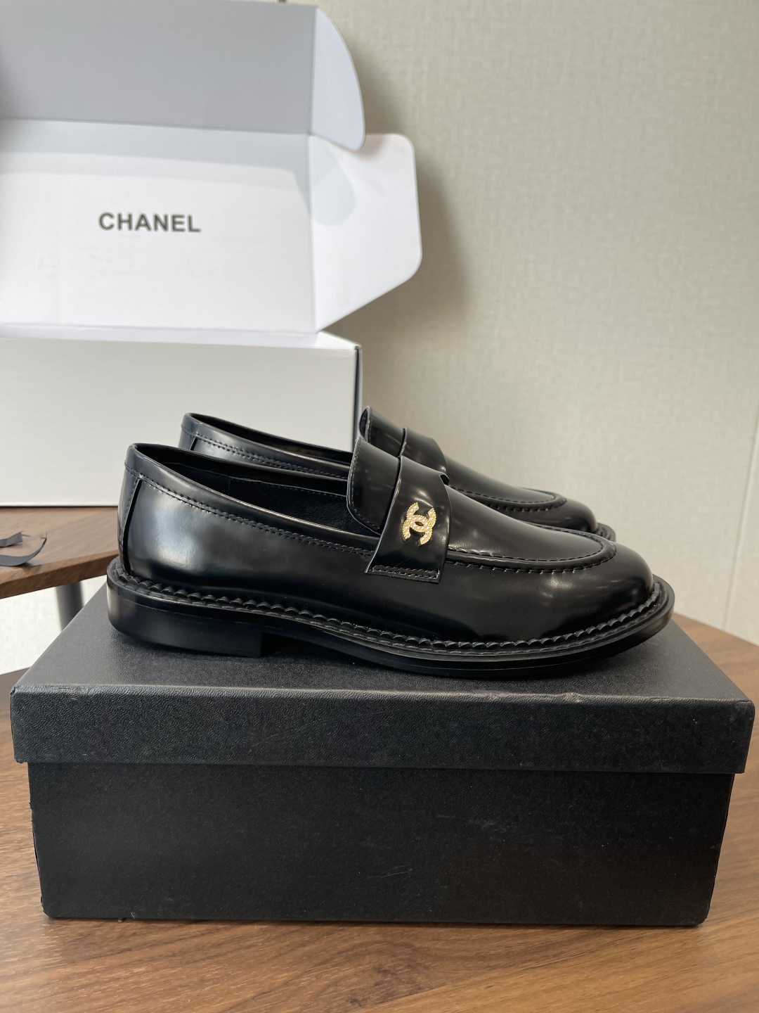 Luxury Chanel Black Calfskin Loafers with Gold CC Hardware