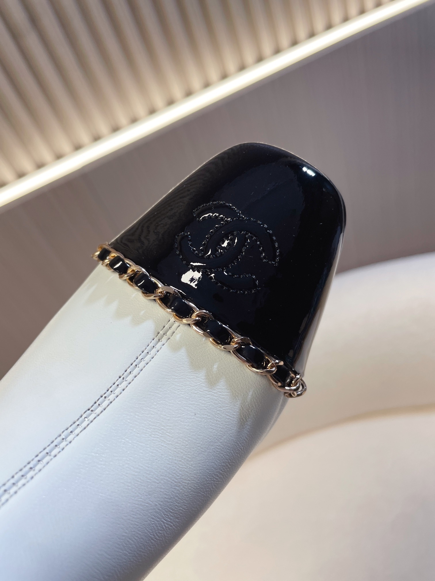 Chanel Two-Tone Leather Ankle Boots - White & Black Patent Toe