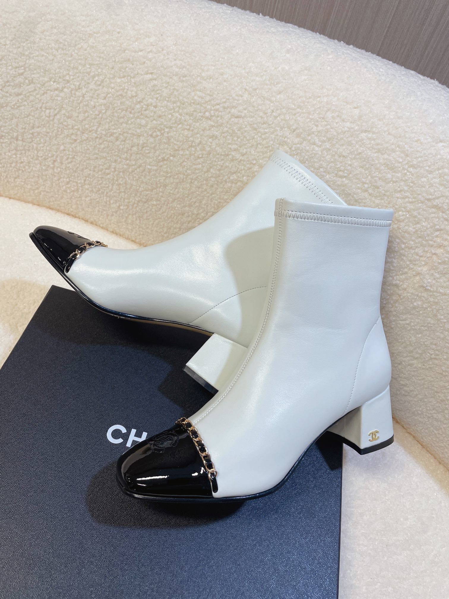 Chanel Two-Tone Leather Ankle Boots - White & Black Patent Toe