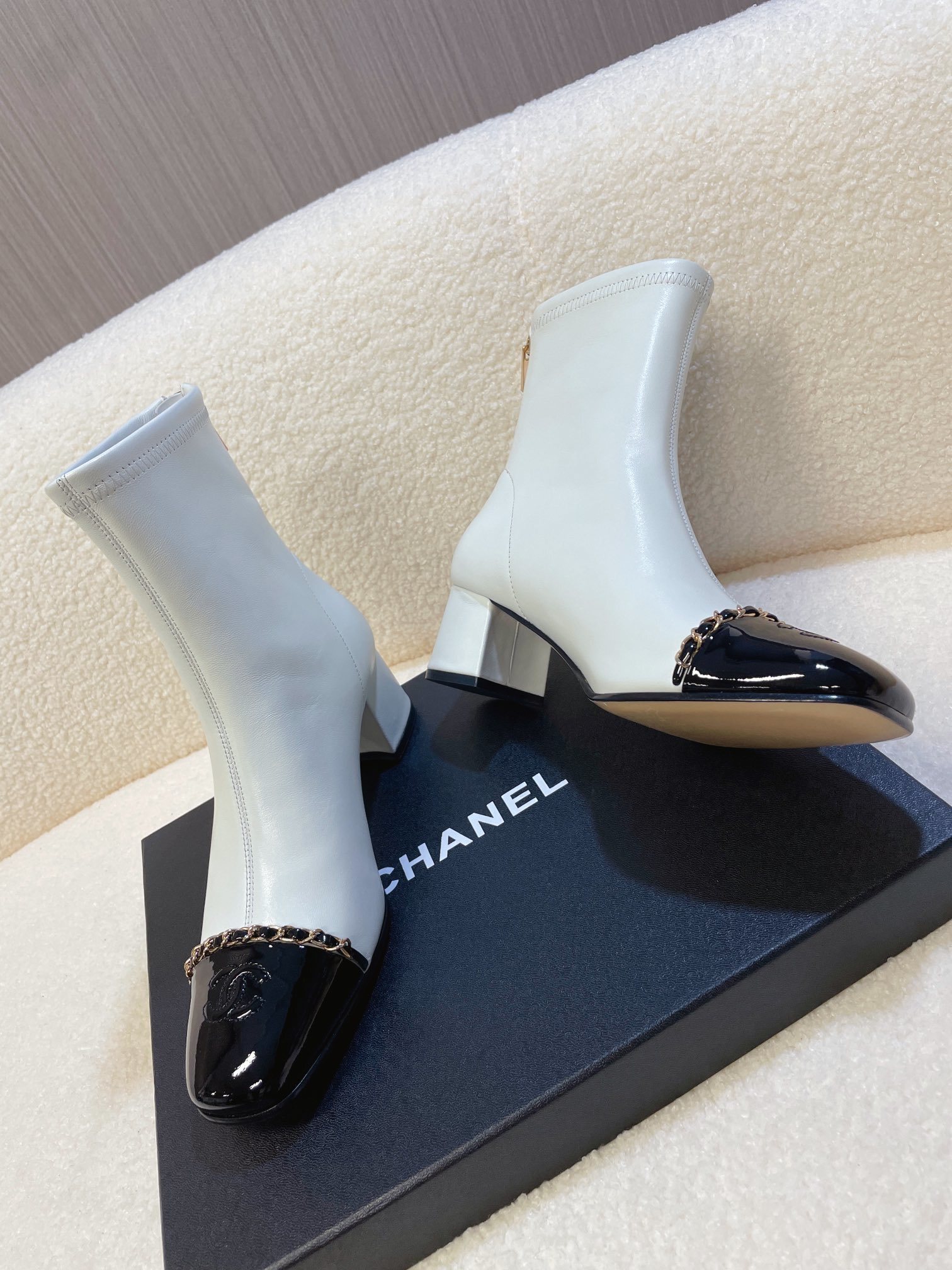 Chanel Two-Tone Leather Ankle Boots - White & Black Patent Toe