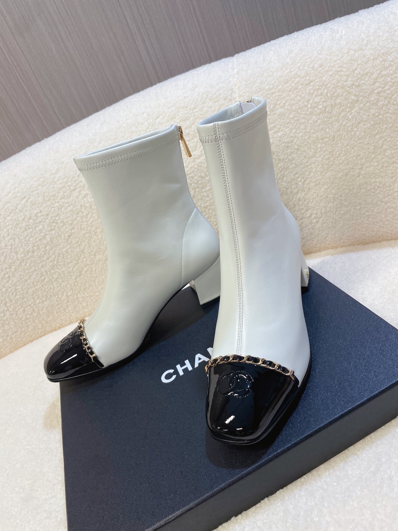 Chanel Two-Tone Leather Ankle Boots - White & Black Patent Toe