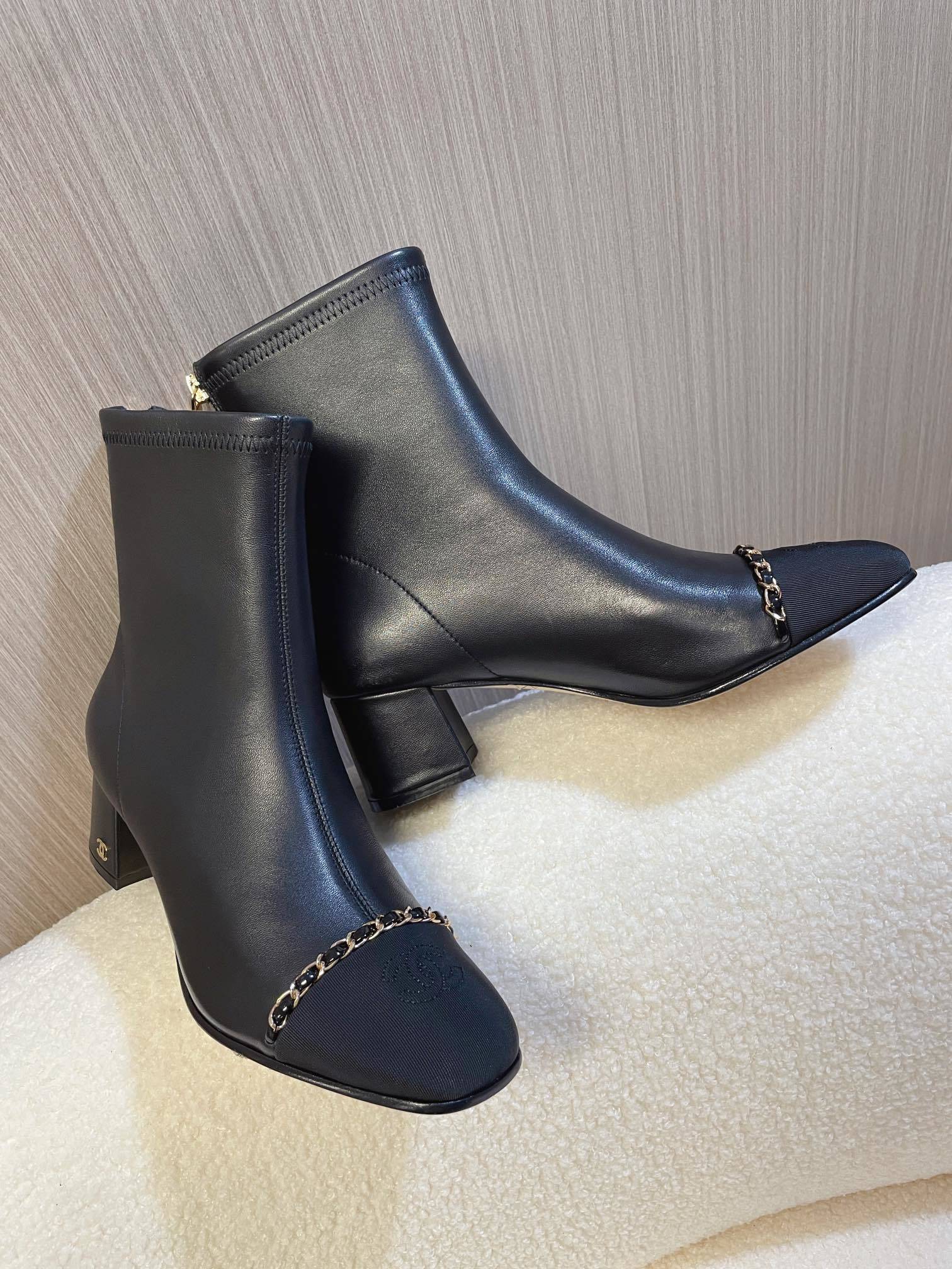 Chanel Black Leather Ankle Boots with Gold Chain Detail