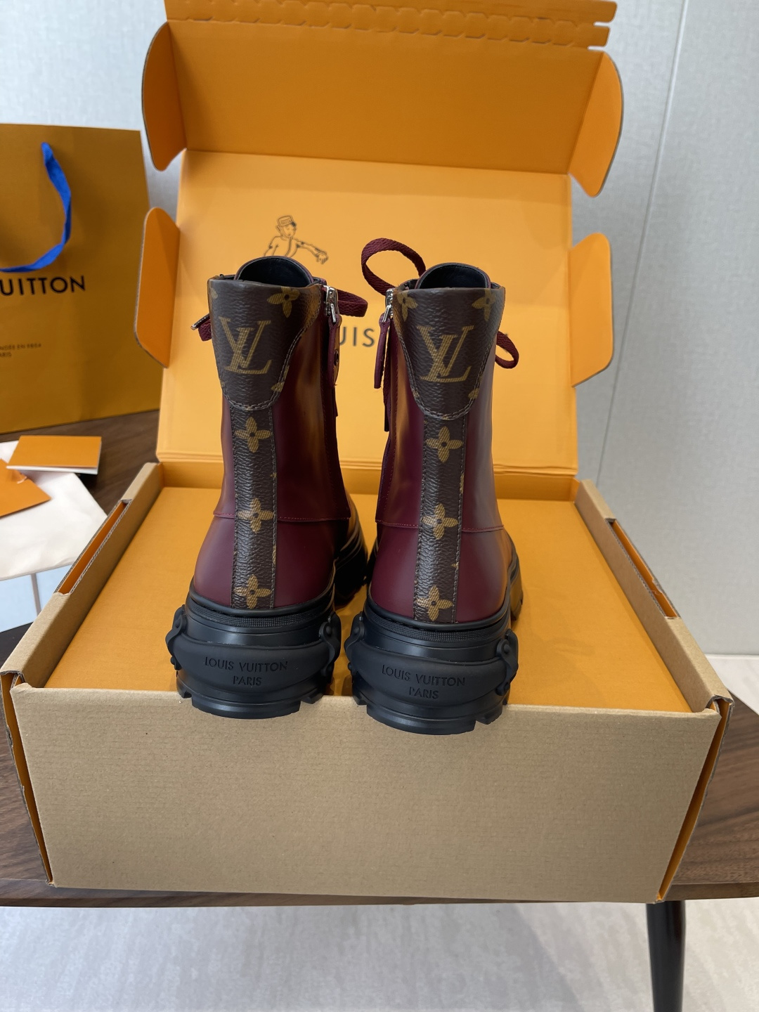 Louis Vuitton Women's Burgundy Leather Ankle Boots with LV Logo