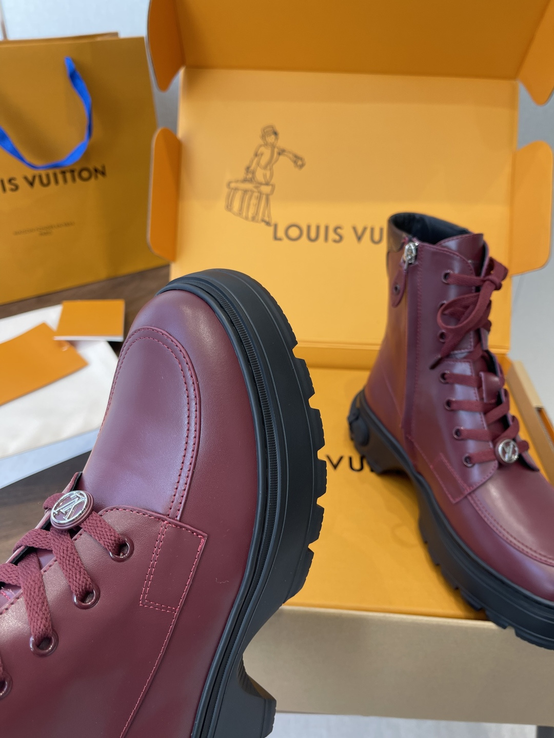 Louis Vuitton Women's Burgundy Leather Ankle Boots with LV Logo