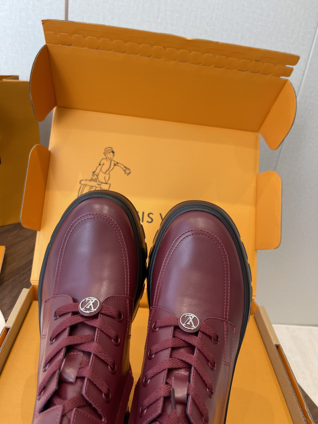 Louis Vuitton Women's Burgundy Leather Ankle Boots with LV Logo