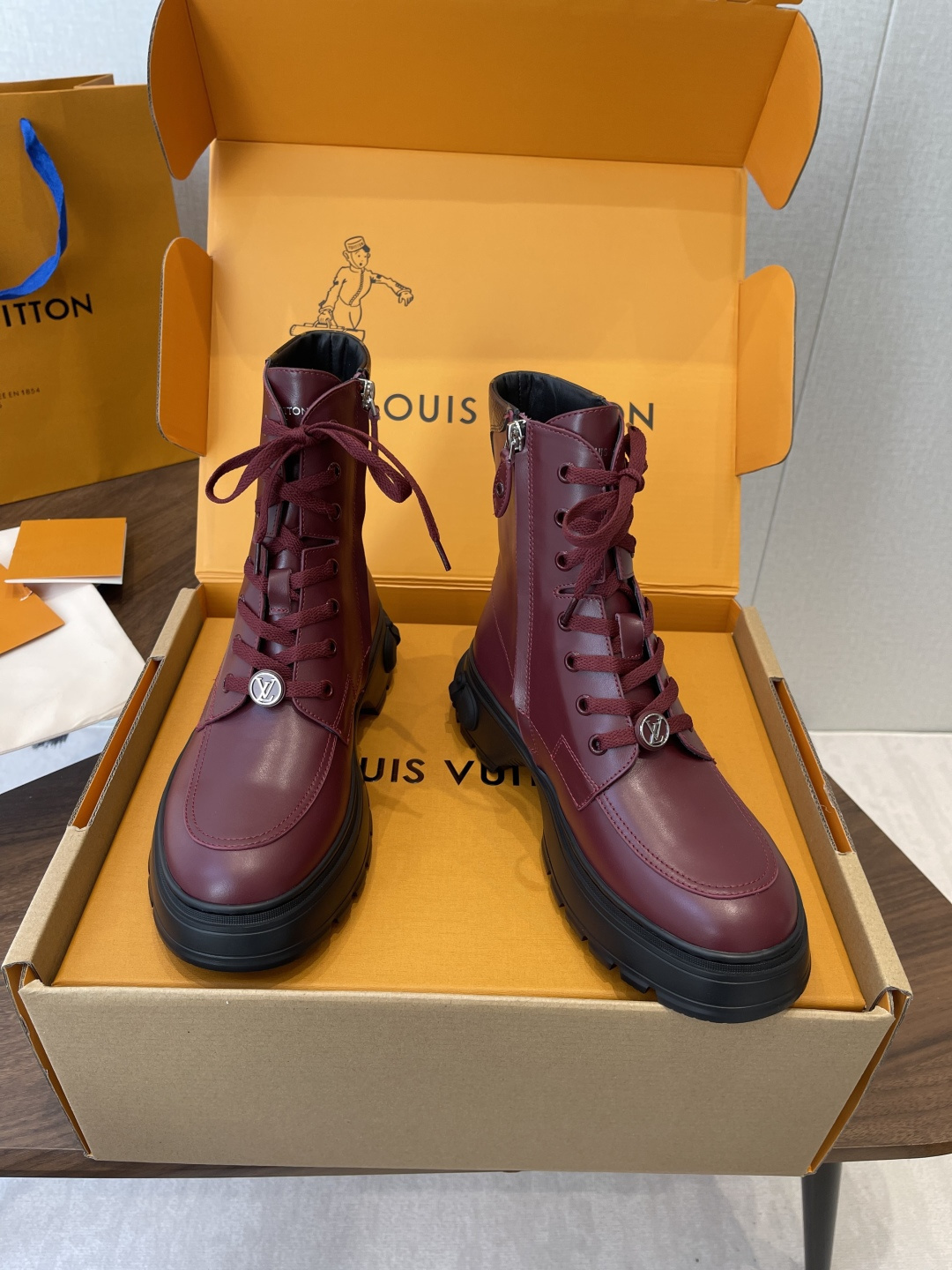 Louis Vuitton Women's Burgundy Leather Ankle Boots with LV Logo