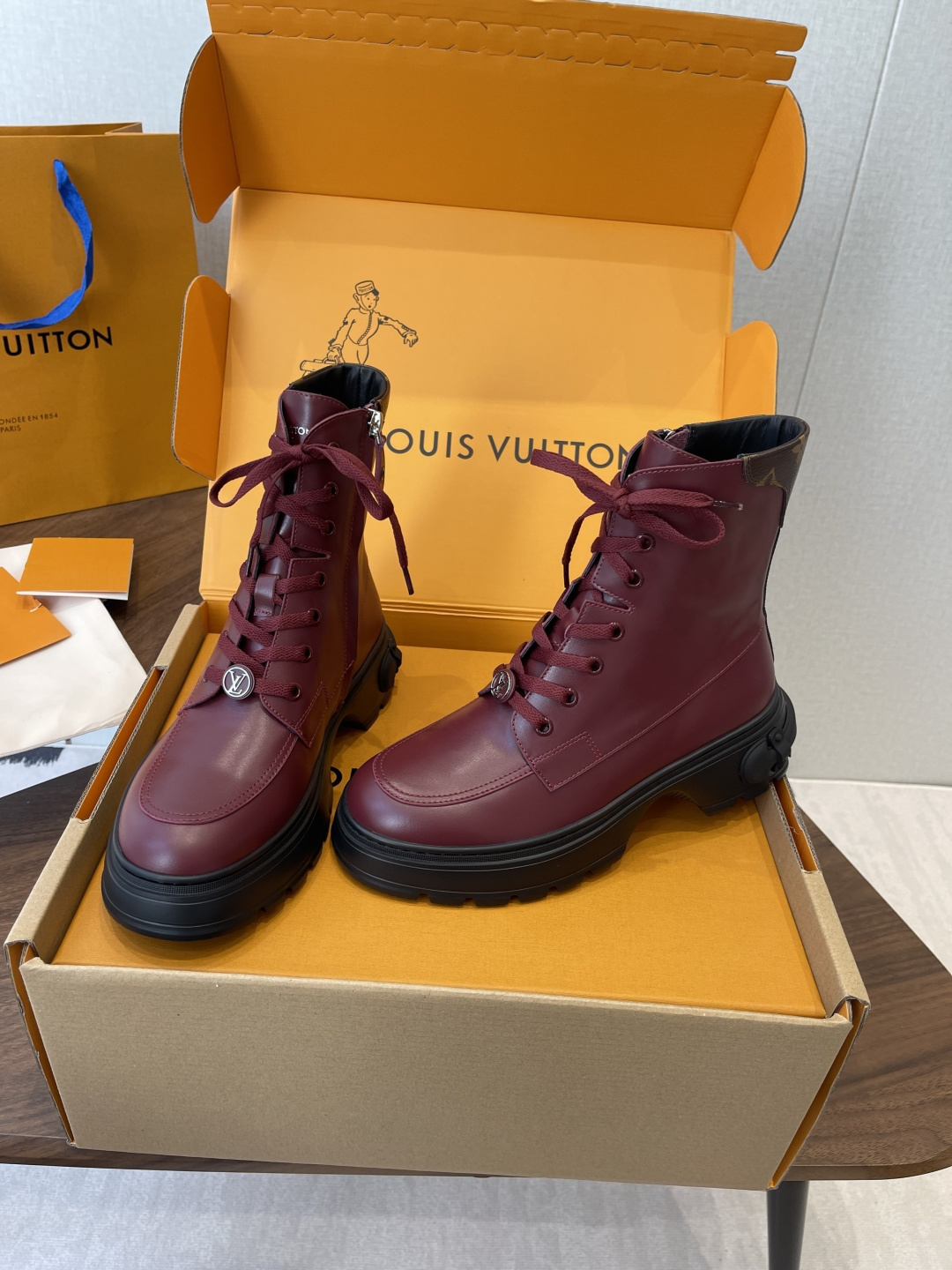 Louis Vuitton Women's Burgundy Leather Ankle Boots with LV Logo