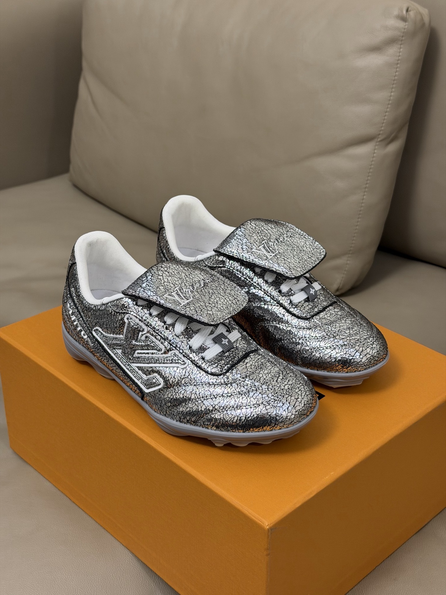 Louis Vuitton LV Footprint Trainer – Metallic Silver Crackled Leather