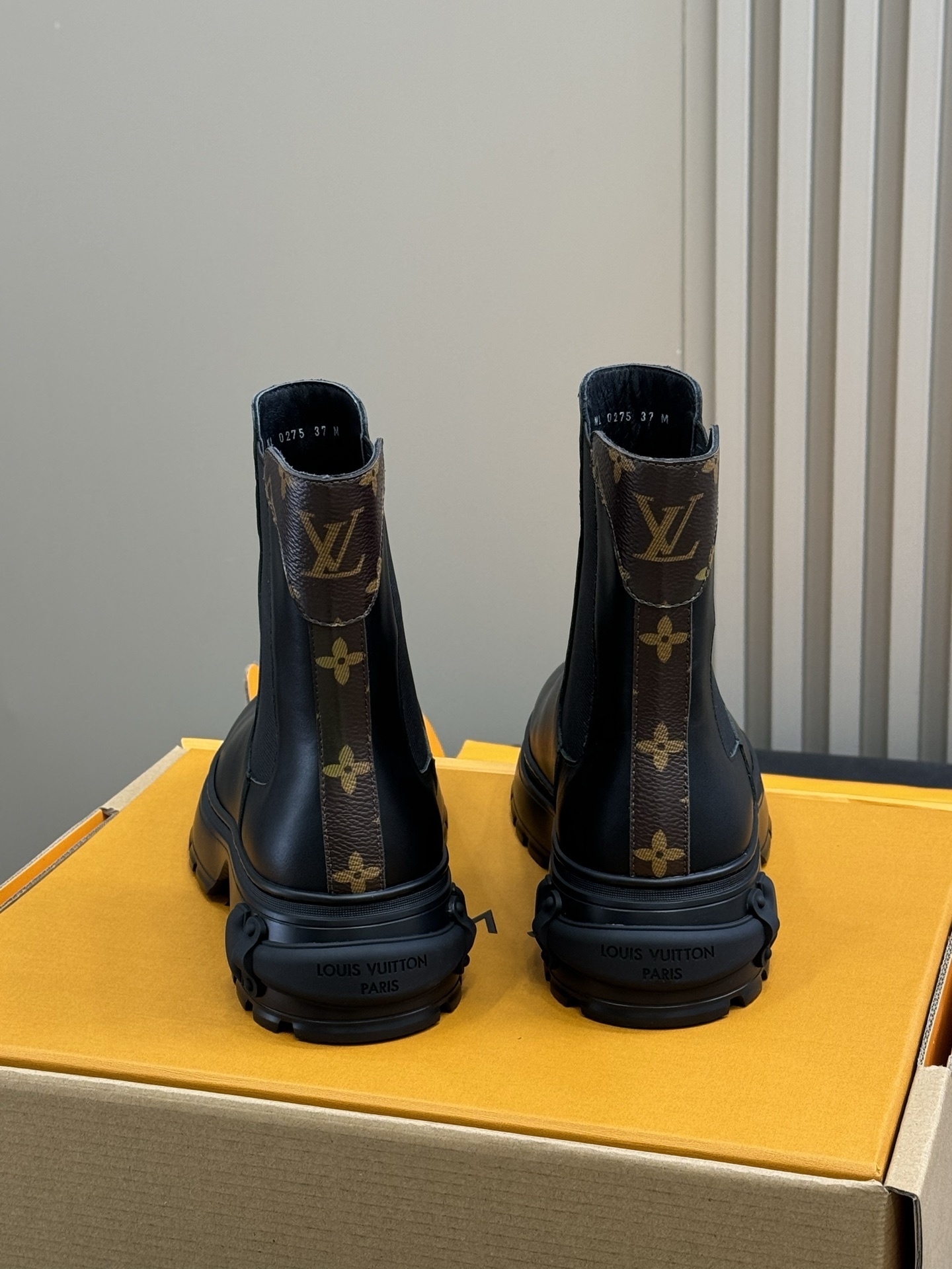 Louis Vuitton Black Leather Chelsea Boots with Monogram Detail