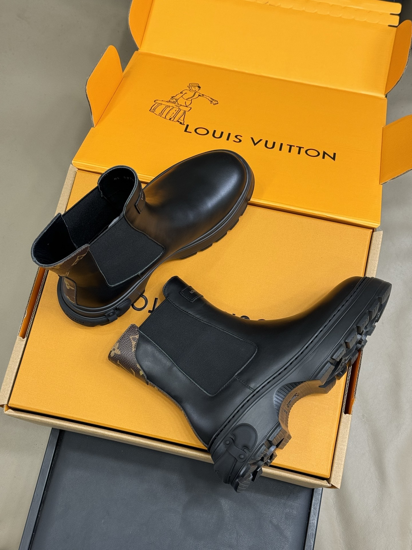 Louis Vuitton Black Leather Chelsea Boots with Monogram Detail