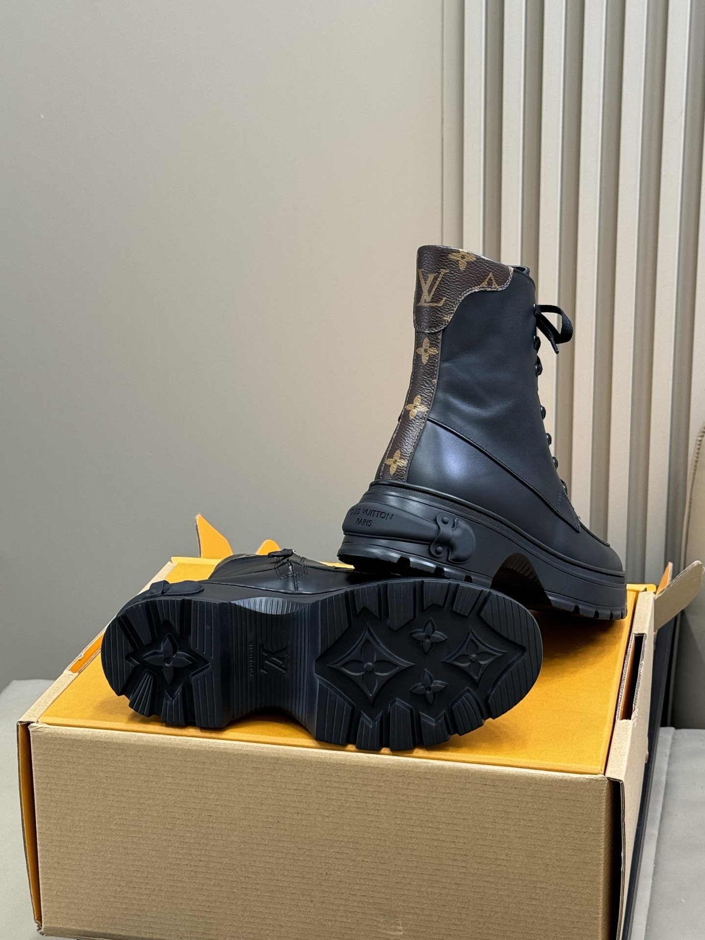 Luxury Black Leather Combat Boots with Monogram Trim Detail