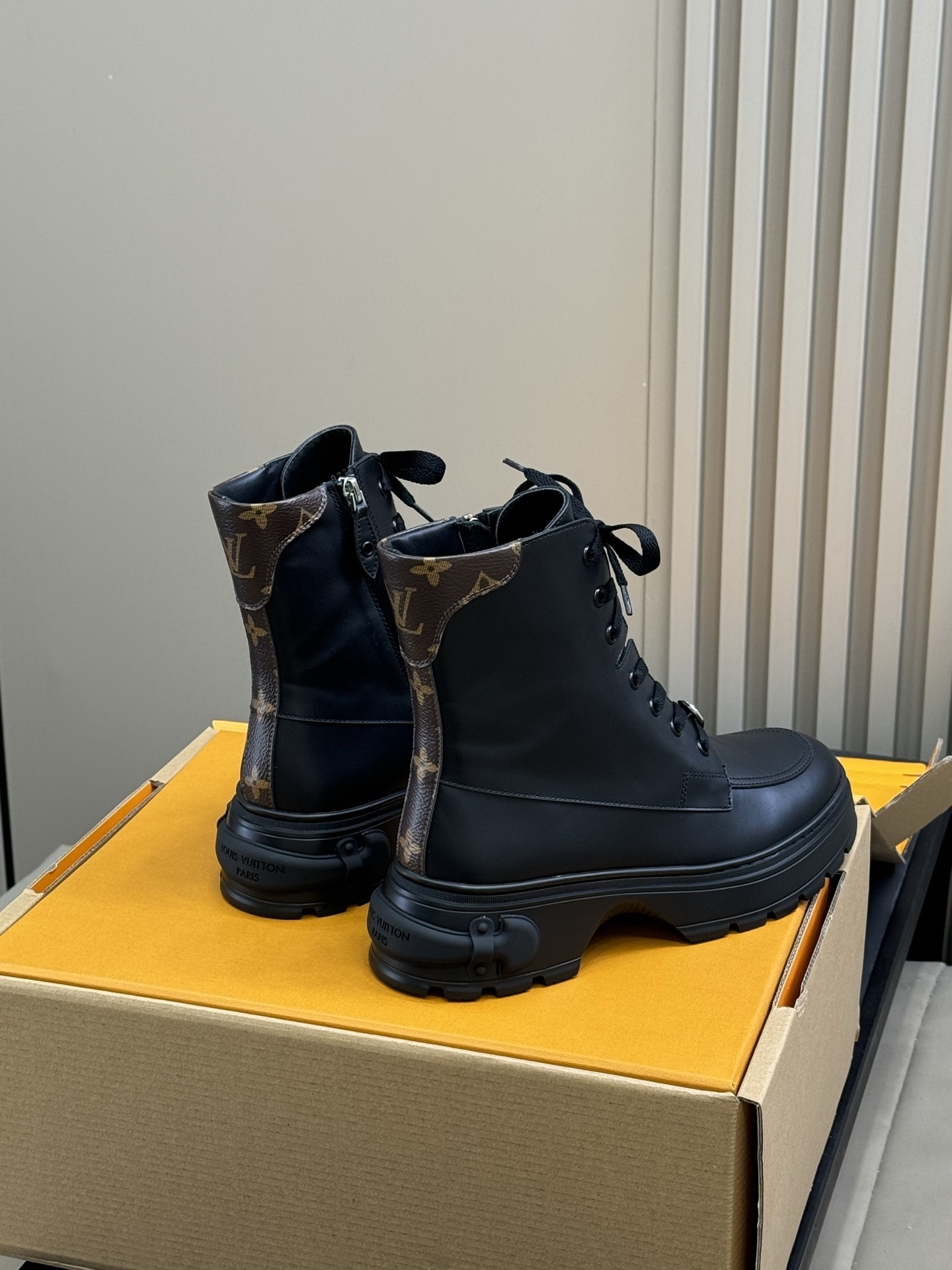 Luxury Black Leather Combat Boots with Monogram Trim Detail