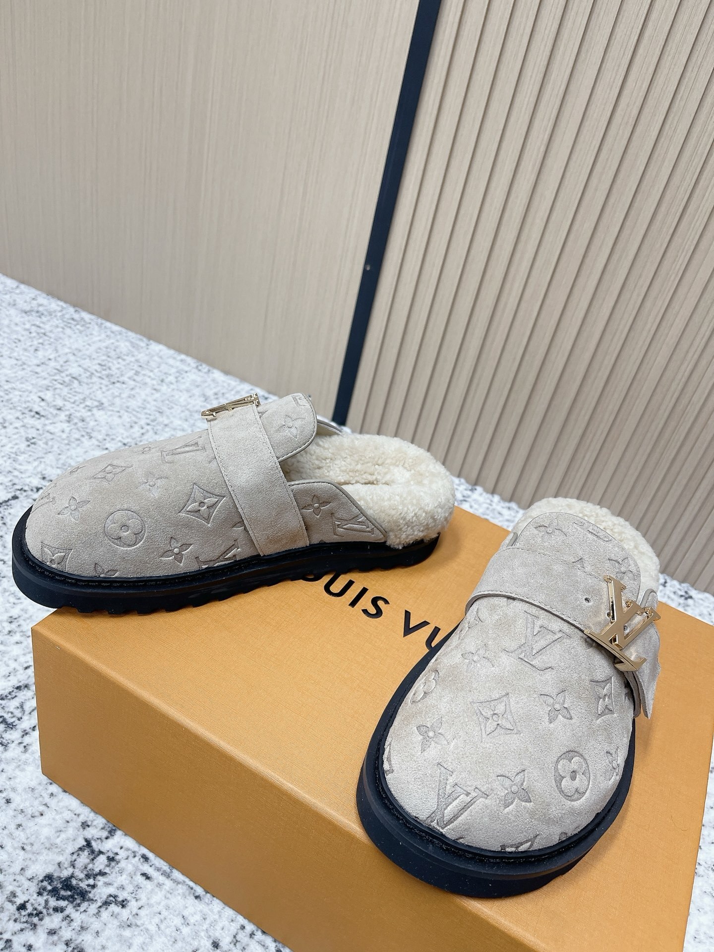 Louis Vuitton Monogram Embossed Suede Shearling Mules