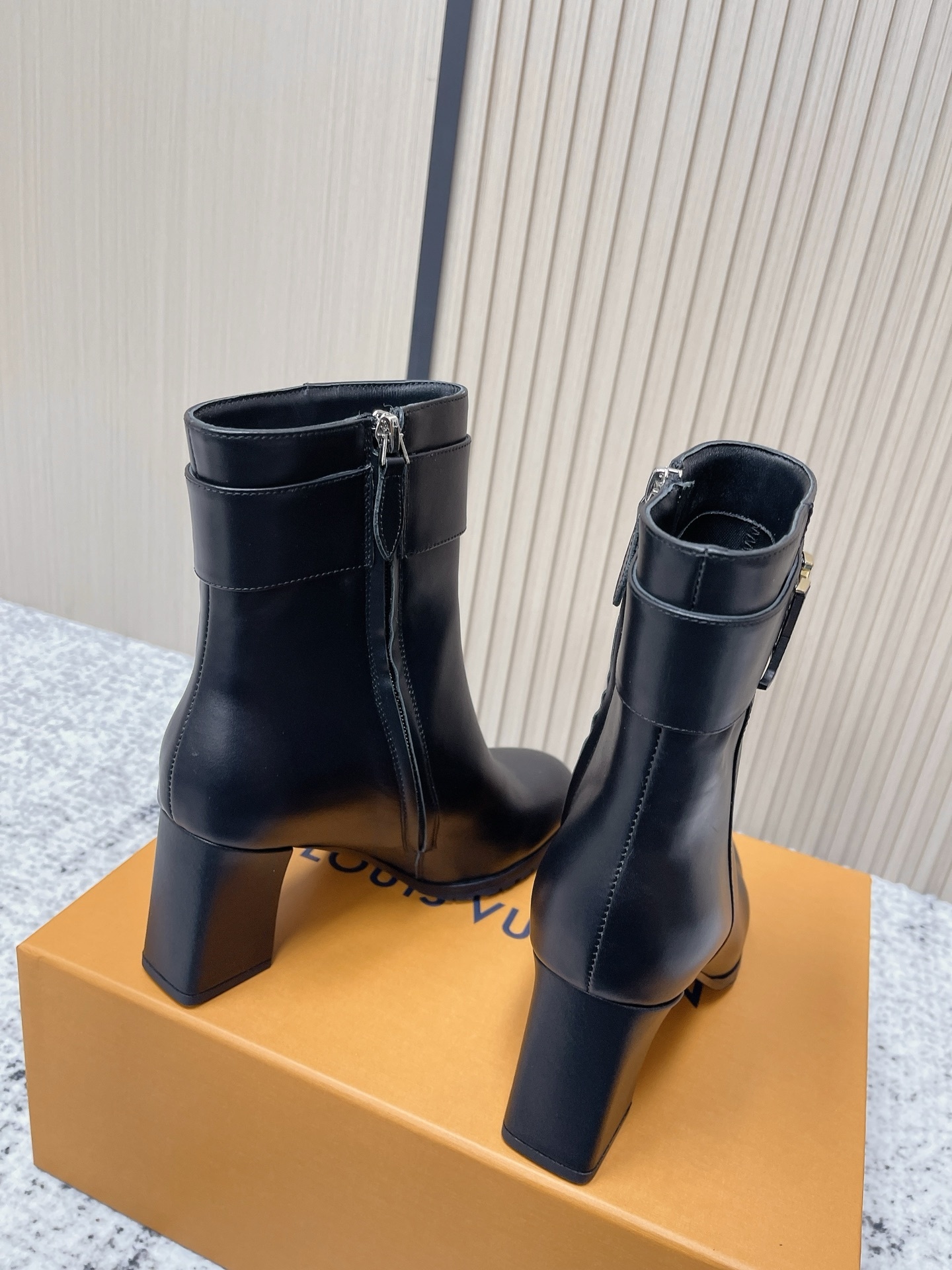 Louis Vuitton Black Leather Ankle Boots with Logo Buckle