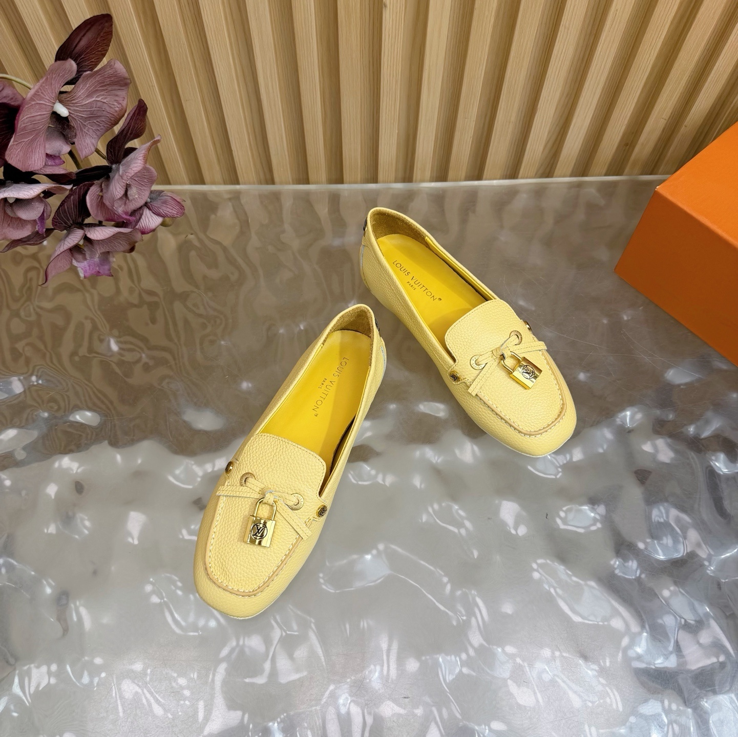 Louis Vuitton Women's Pale Yellow Grained Leather Loafers