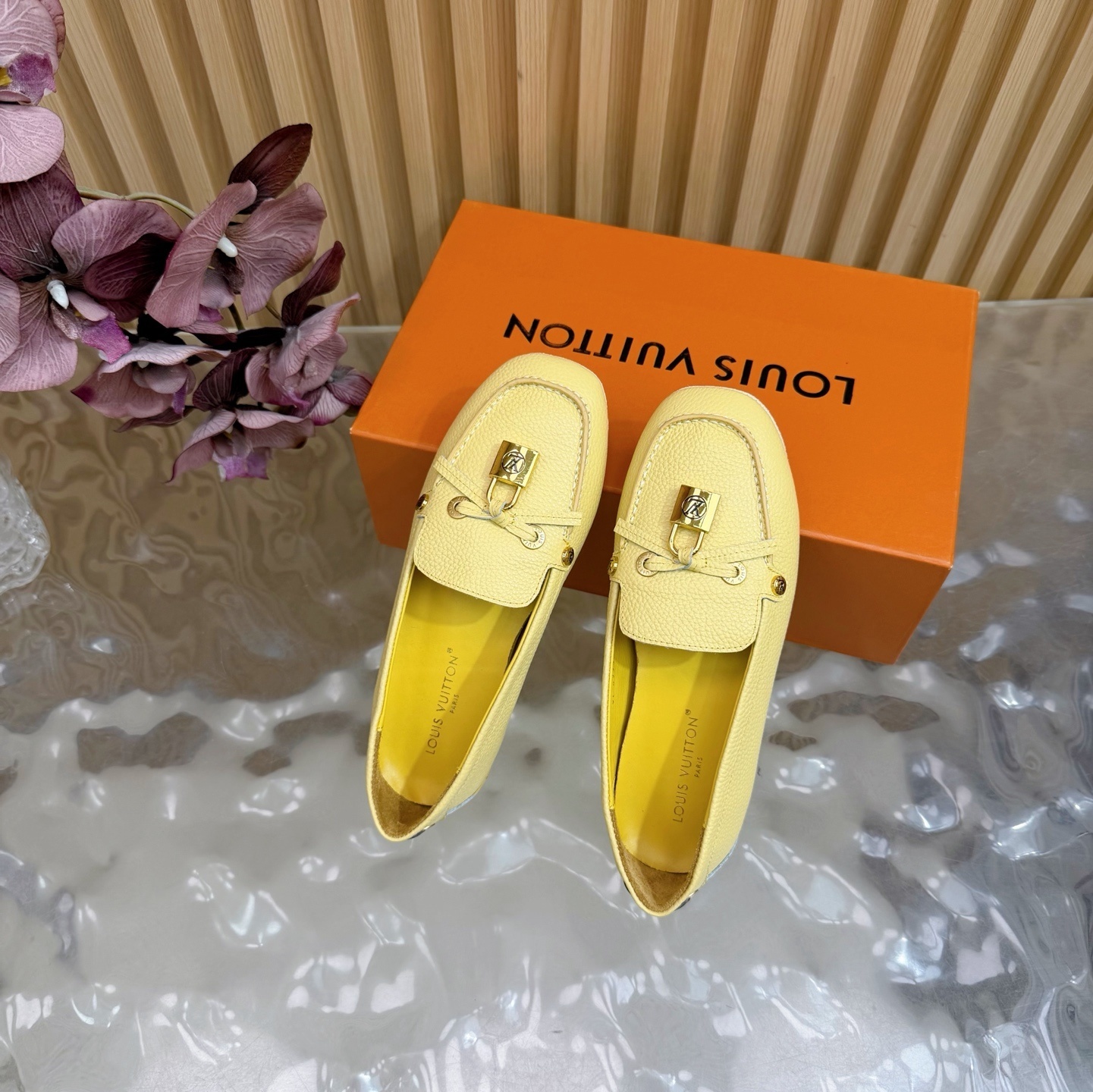 Louis Vuitton Women's Pale Yellow Grained Leather Loafers